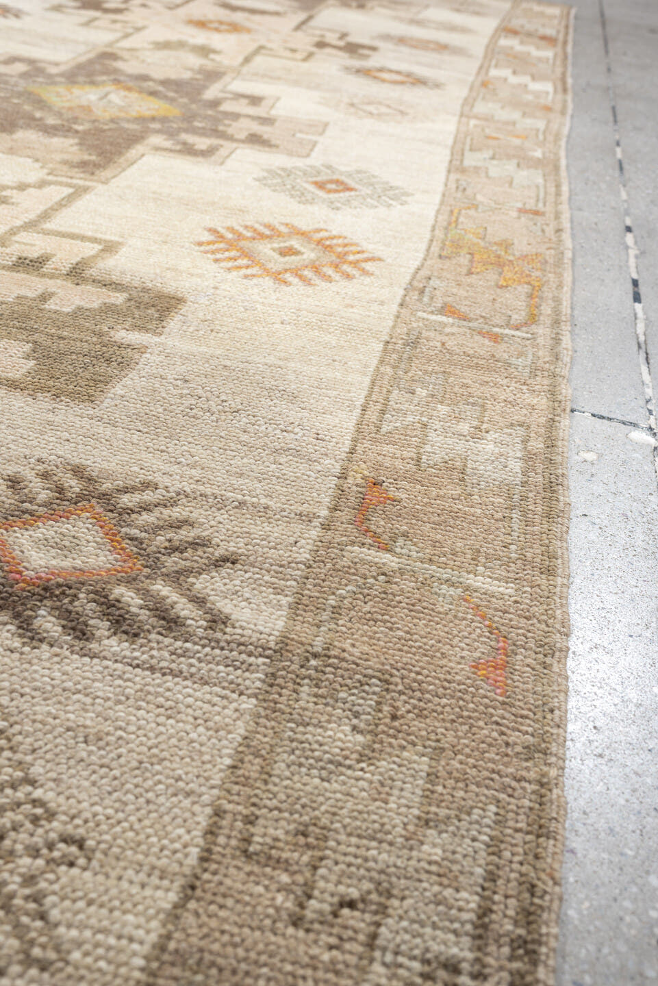 4' x 10' one-of-a-kind handmade antique Anatolian runner rug. Color palette: ivory, taupe, charcoal, camel, coral, rose