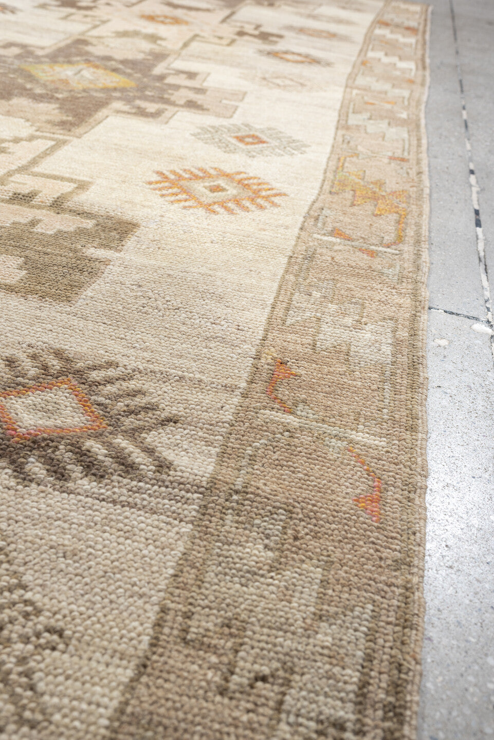 4' x 10' one-of-a-kind handmade antique Anatolian runner rug. Color palette: ivory, taupe, charcoal, camel, coral, rose