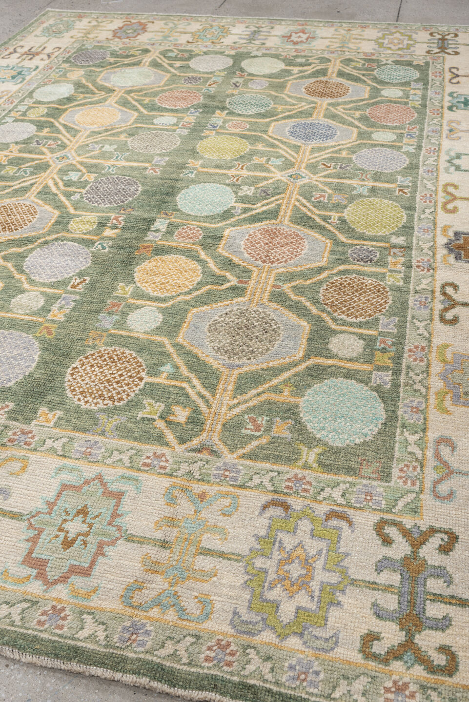 8' x 10' one-of-a-kind handmade antique Oushak large size rug. Color palette: sage, ivory, coral, gold, pale blue, charcoal
