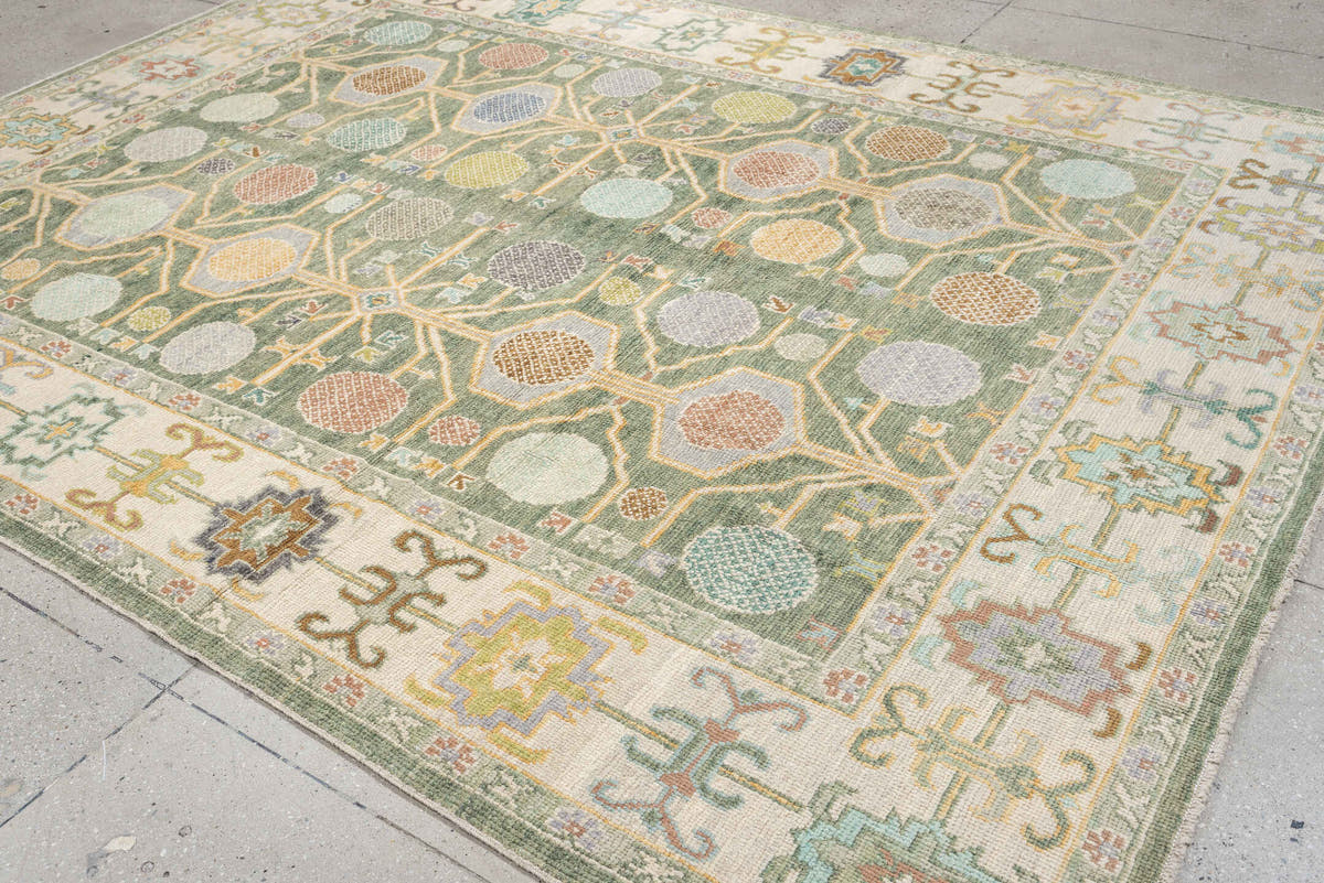 8' x 10' one-of-a-kind handmade antique Oushak large size rug. Color palette: sage, ivory, coral, gold, pale blue, charcoal
