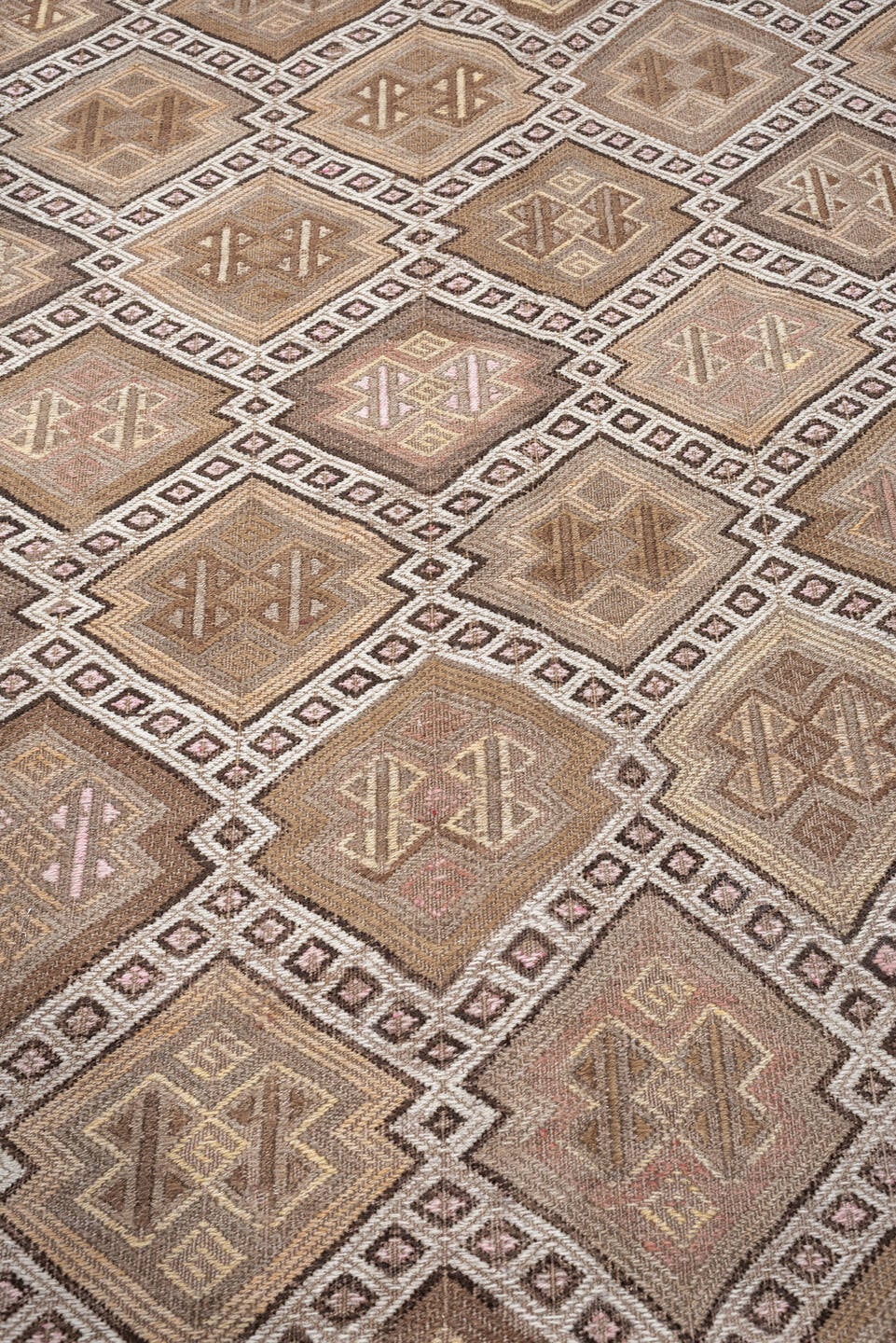 4' x 16' one-of-a-kind handmade antique Jijim runner rug. Color palette: ivory, taupe, camel, dusty rose, brown, charcoal