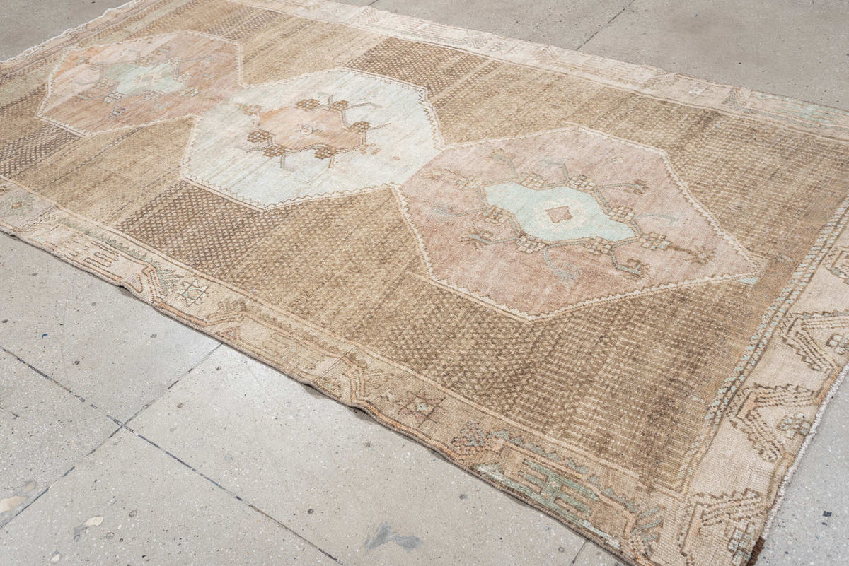 5' x 10' one-of-a-kind handmade antique Kars large size rug. Color palette: taupe, ivory, blush, sage, camel, charcoal, rose