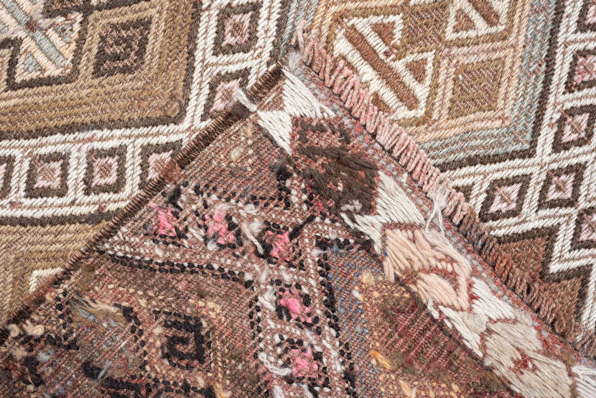5' x 14' one-of-a-kind handmade antique Jijim rug. Color palette: taupe, ivory, camel, dusty rose, rust, brown, charcoal