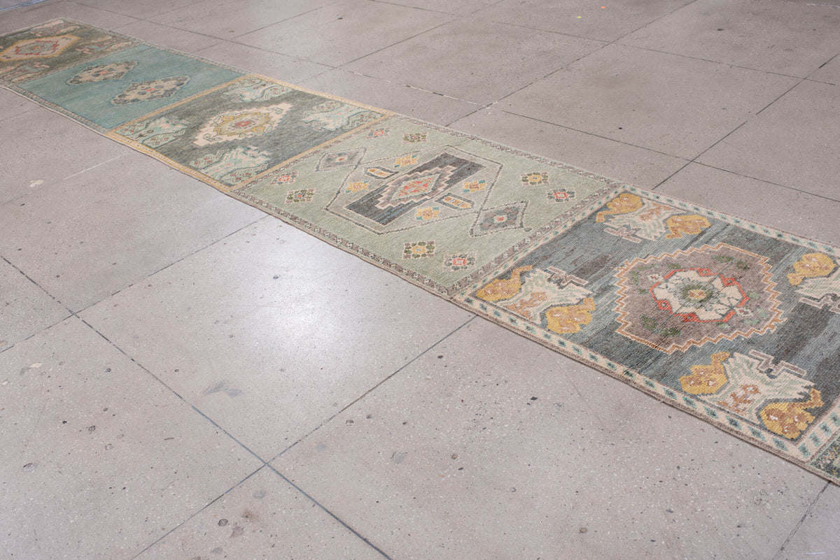 2' x 32' one-of-a-kind handmade vintage Oushak runner rug. Color palette: sage, aqua, ivory, terracotta, ochre, coral