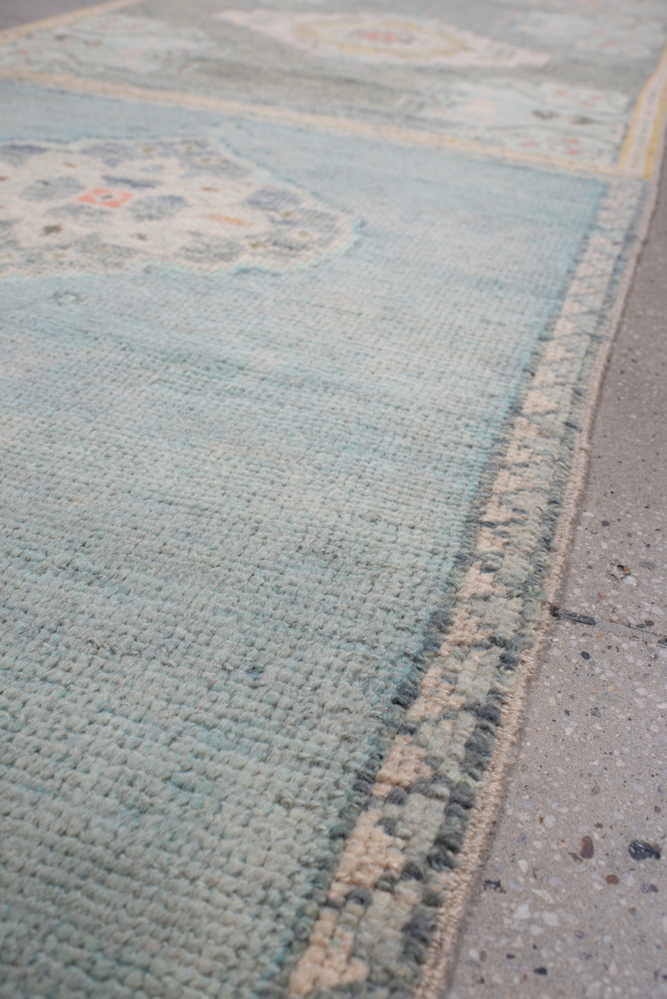 2' x 32' one-of-a-kind handmade vintage Oushak runner rug. Color palette: sage, aqua, ivory, terracotta, ochre, coral