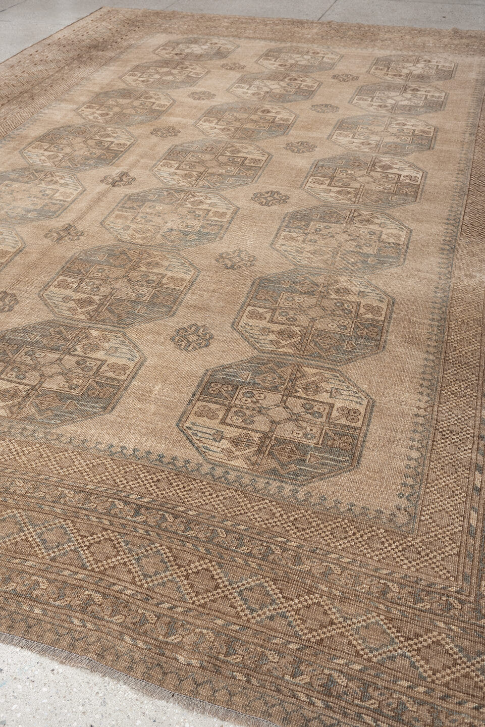 9' x 12' one-of-a-kind handmade antique Afghan large size rug. Color palette: camel, taupe, slate, ivory, brown, charcoal