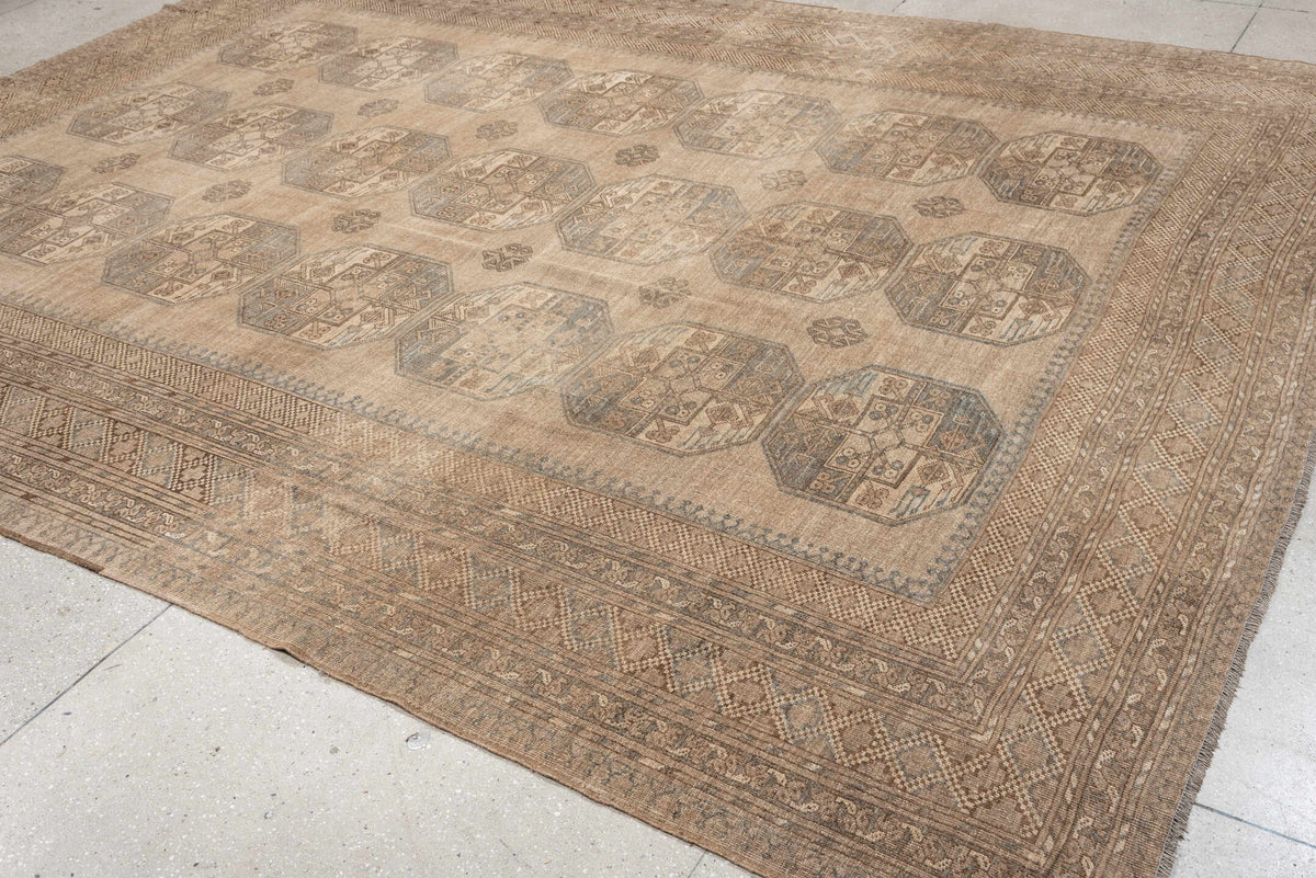 9' x 12' one-of-a-kind handmade antique Afghan large size rug. Color palette: camel, taupe, slate, ivory, brown, charcoal