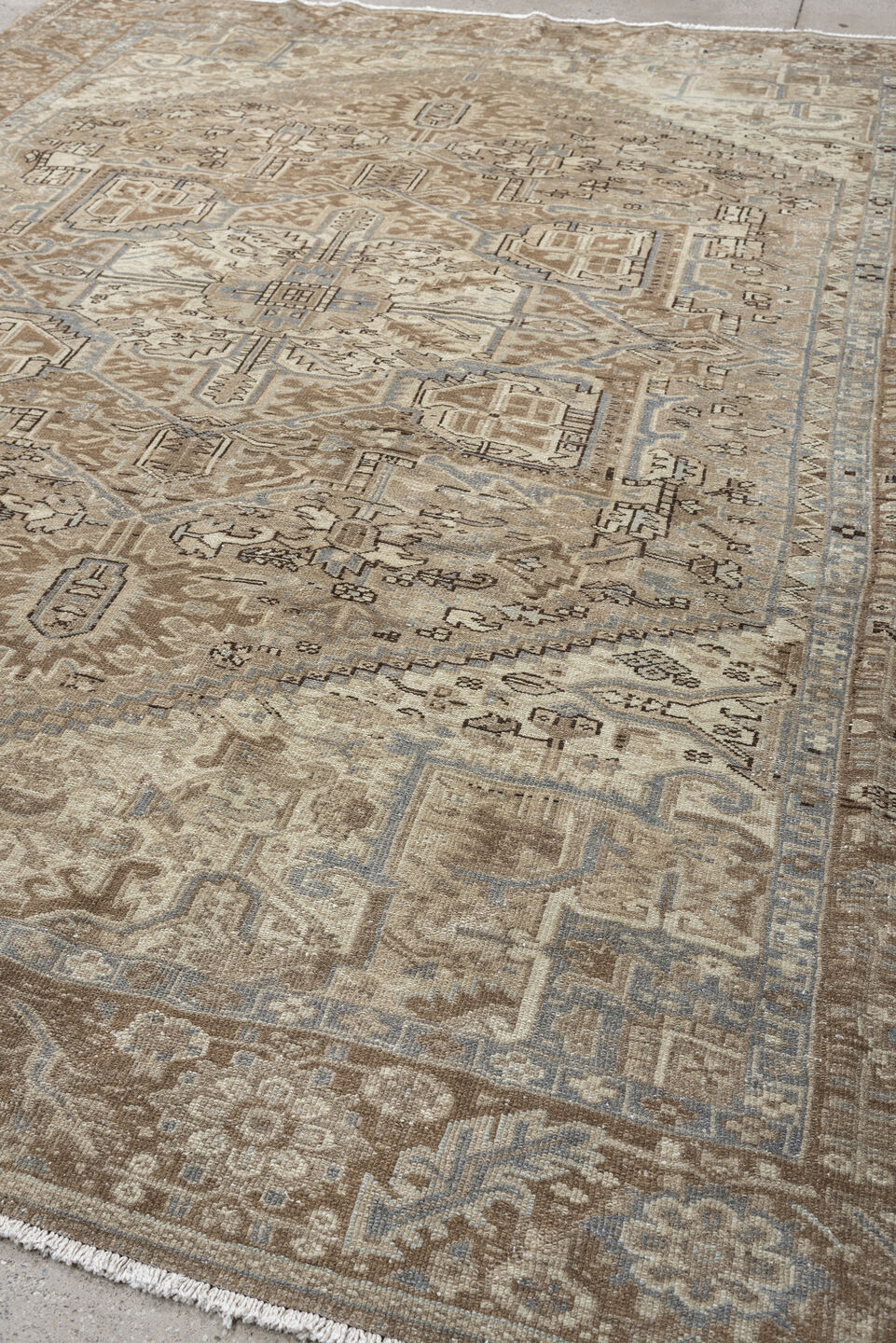 9' x 10' one-of-a-kind handmade antique Heriz large size rug. Color palette: taupe, ivory, brown, slate blue, charcoal