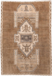 6' x 9' one-of-a-kind handmade antique Kars medium size rug. Color palette: camel, taupe, ivory, brown, charcoal, sand