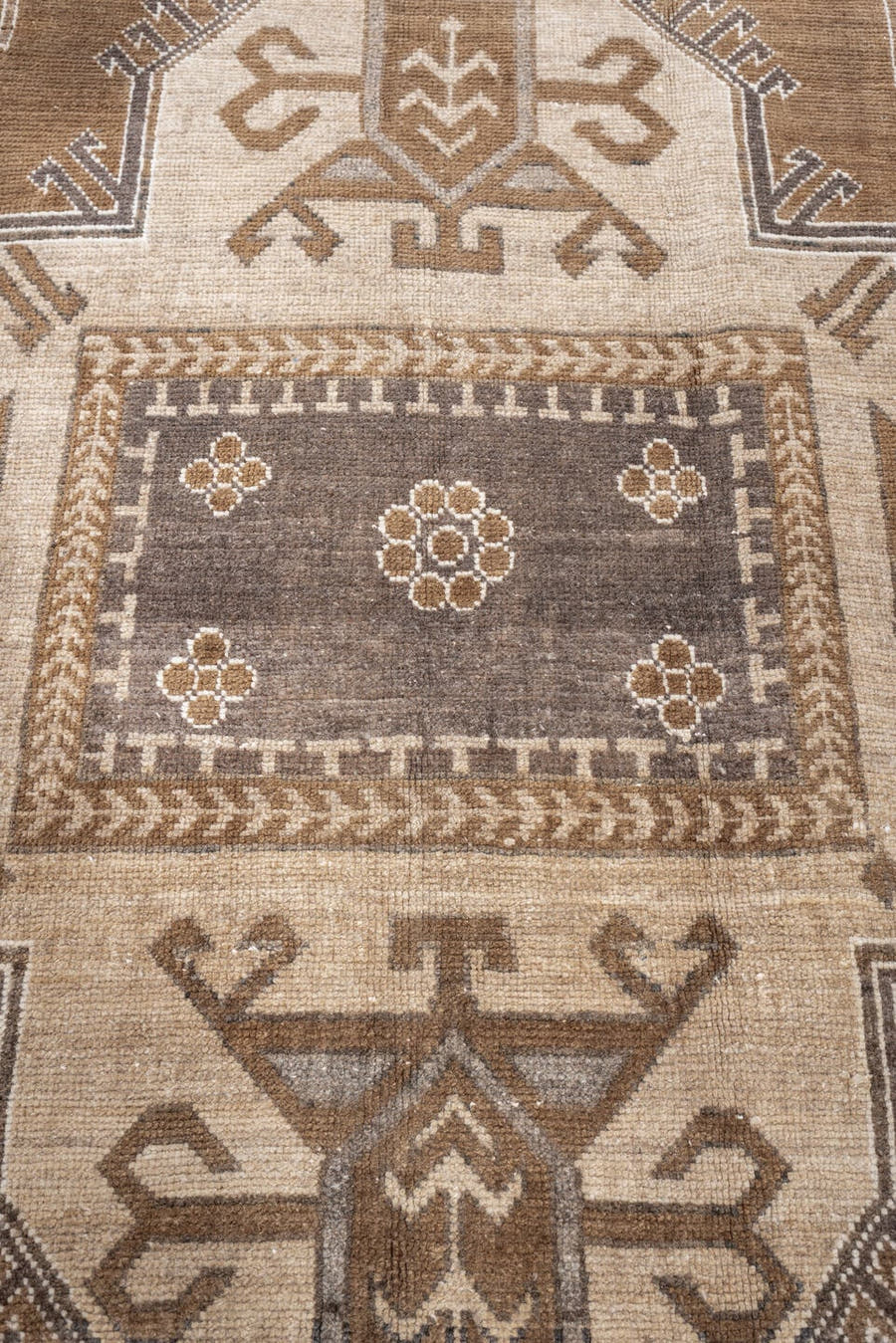 6' x 9' one-of-a-kind handmade antique Kars medium size rug. Color palette: camel, taupe, ivory, brown, charcoal, sand