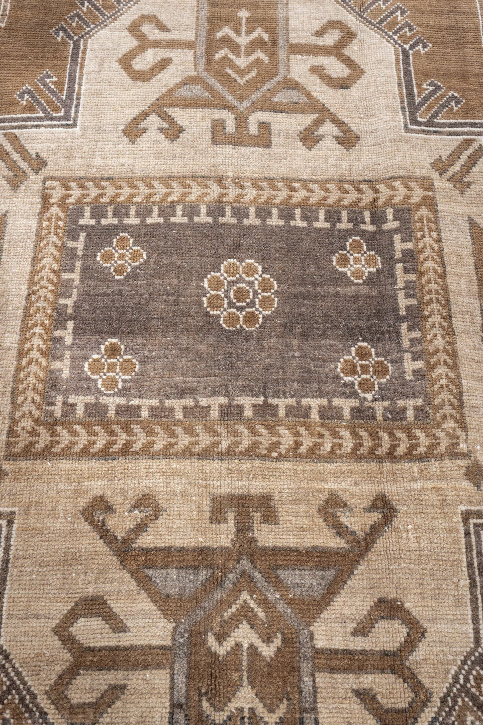 6' x 9' one-of-a-kind handmade antique Kars medium size rug. Color palette: camel, taupe, ivory, brown, charcoal, sand