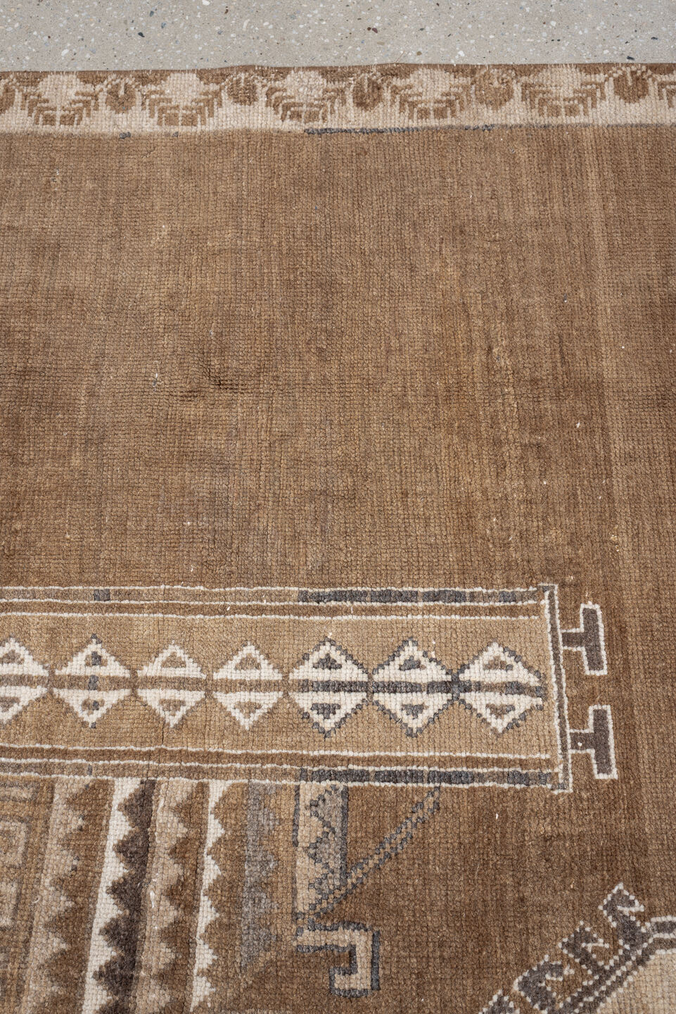 6' x 9' one-of-a-kind handmade antique Kars medium size rug. Color palette: camel, taupe, ivory, brown, charcoal, sand