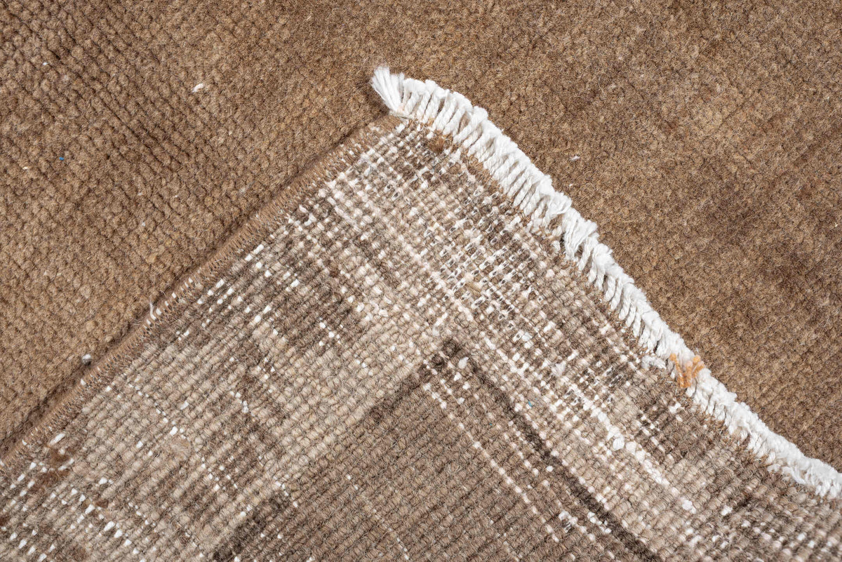 6' x 9' one-of-a-kind handmade antique Kars medium size rug. Color palette: camel, taupe, ivory, brown, charcoal, sand