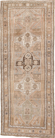 4' x 12' one-of-a-kind handmade antique Kars runner rug. Color palette: camel, taupe, ivory, brown, beige, charcoal, gray