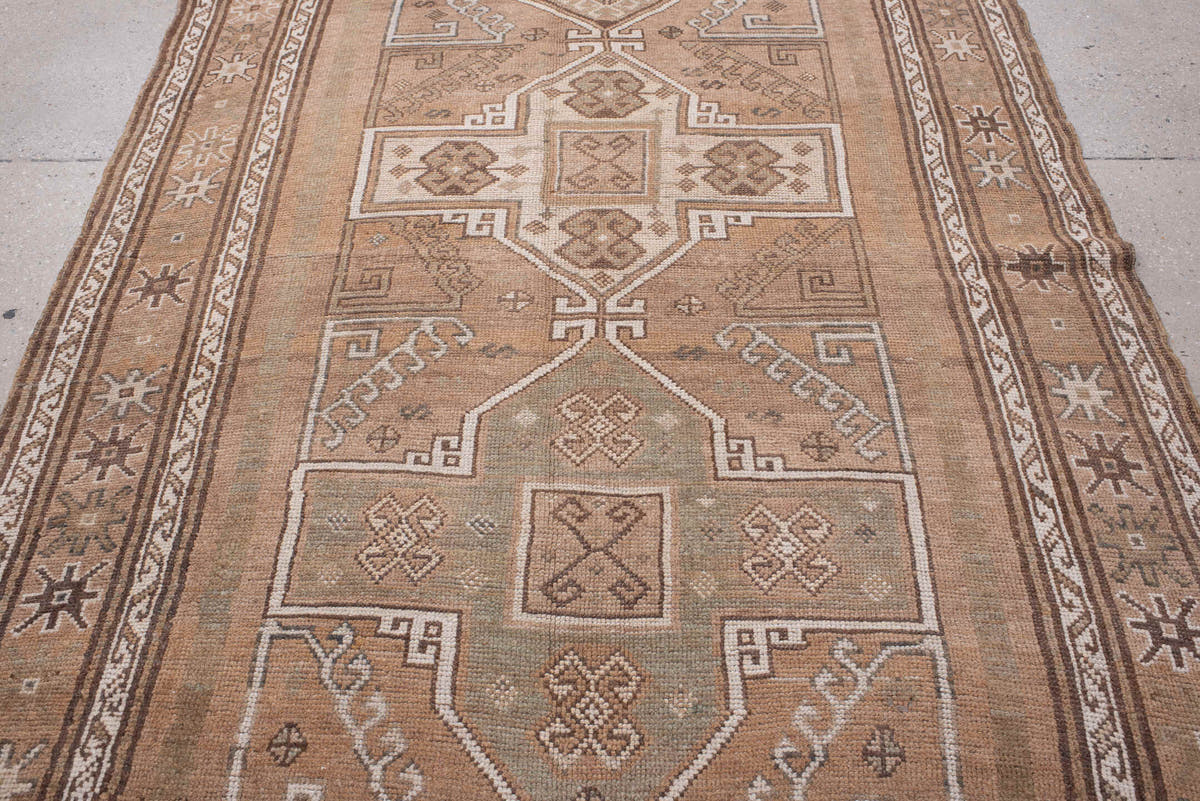 4' x 12' one-of-a-kind handmade antique Kars runner rug. Color palette: camel, taupe, ivory, brown, beige, charcoal, gray