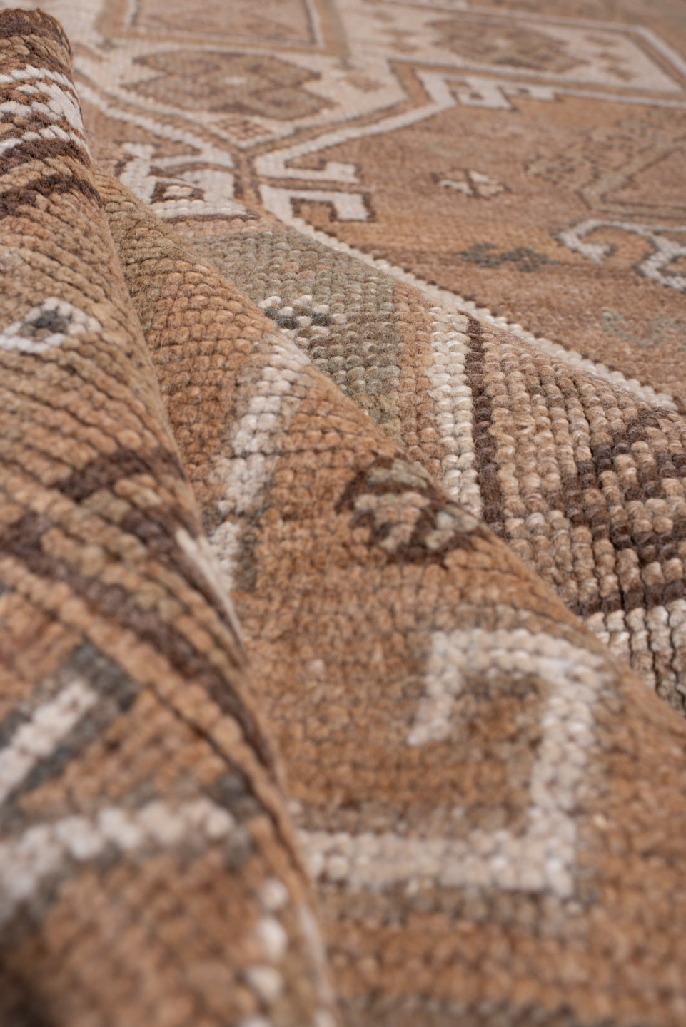 4' x 12' one-of-a-kind handmade antique Kars runner rug. Color palette: camel, taupe, ivory, brown, beige, charcoal, gray