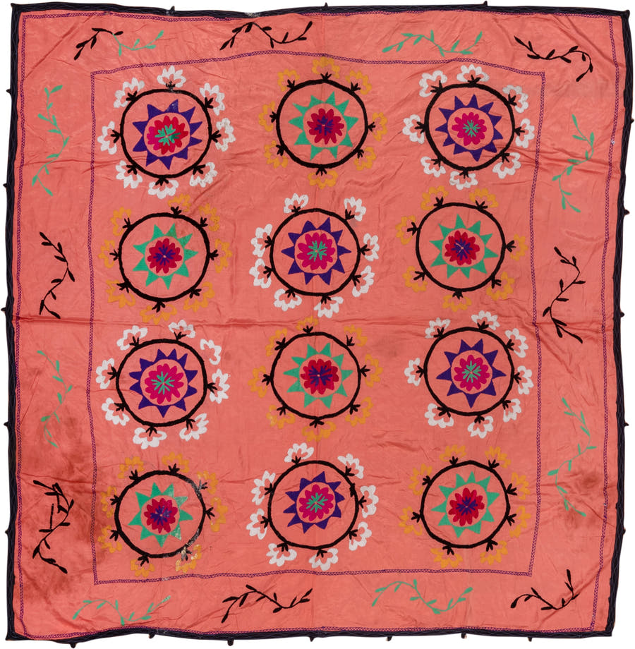 7' x 7' one-of-a-kind handmade vintage Suzani rug. Color palette: coral, black, teal, violet, white, gold, crimson
