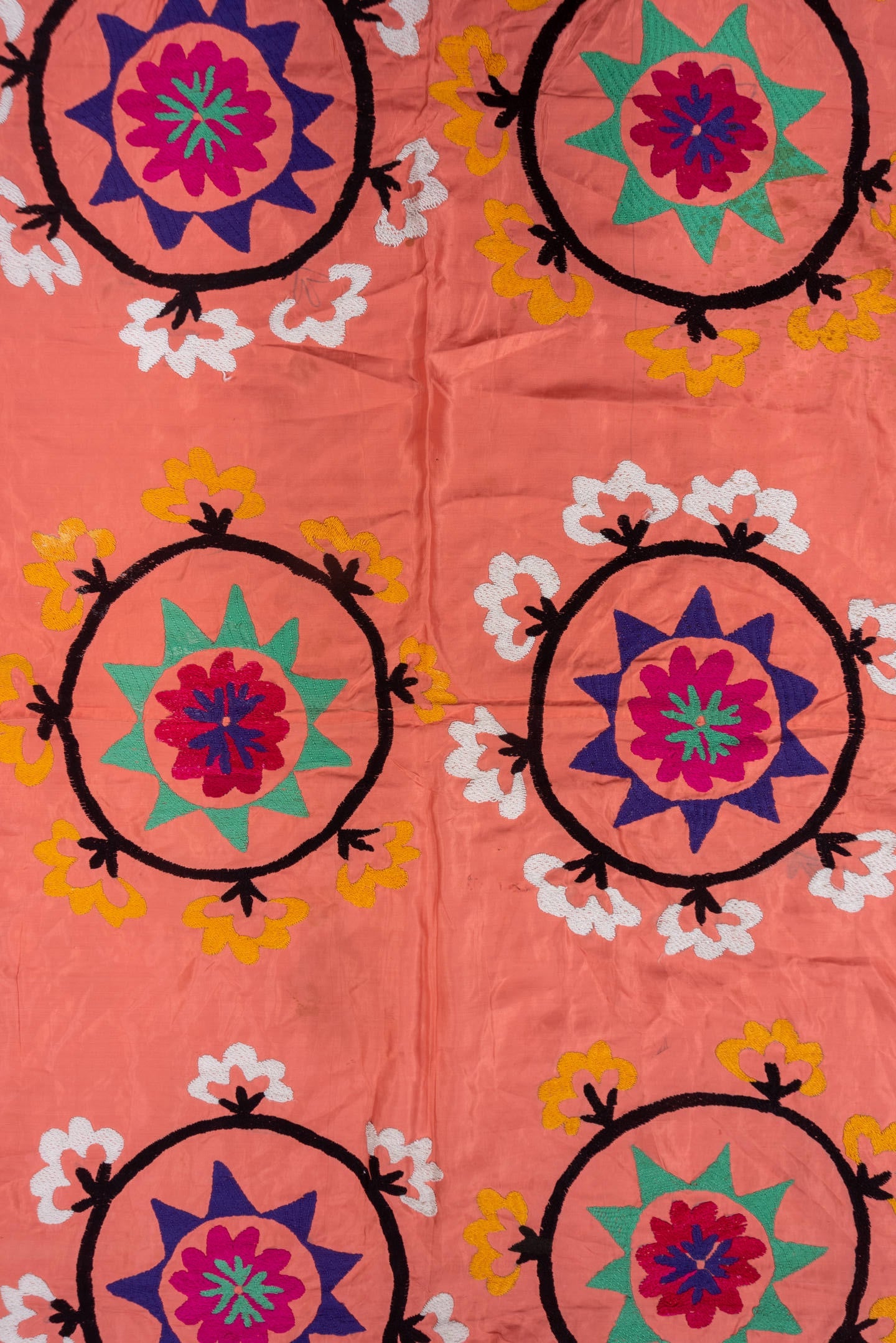 7' x 7' one-of-a-kind handmade vintage Suzani rug. Color palette: coral, black, teal, violet, white, gold, crimson