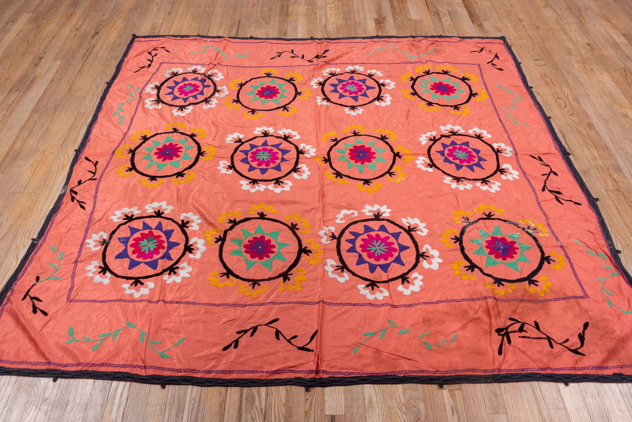 7' x 7' one-of-a-kind handmade vintage Suzani rug. Color palette: coral, black, teal, violet, white, gold, crimson