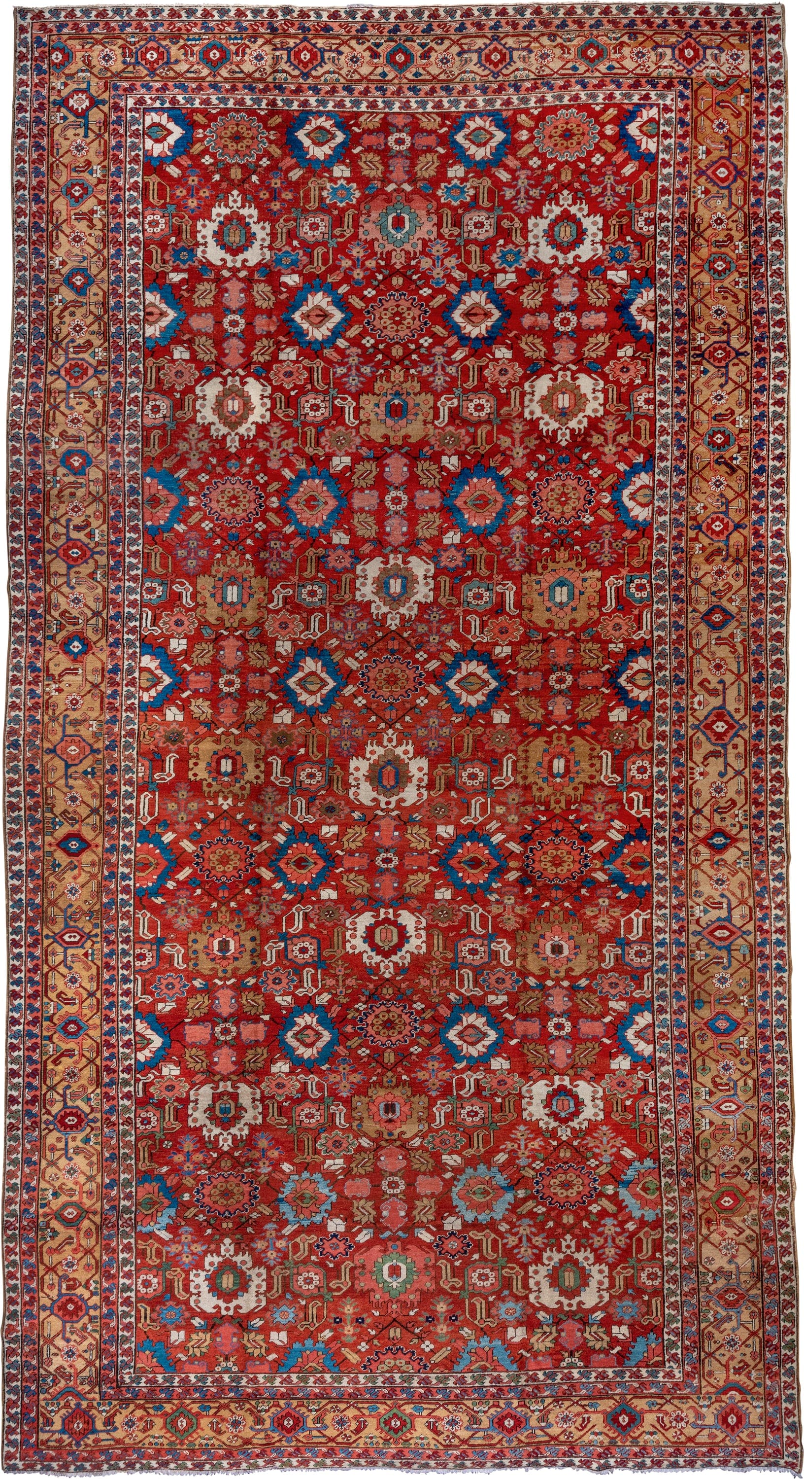 11' x 21' one-of-a-kind handmade antique Serapi oversize rug. Color palette: red, ivory, camel, blue, rose, rust, sage