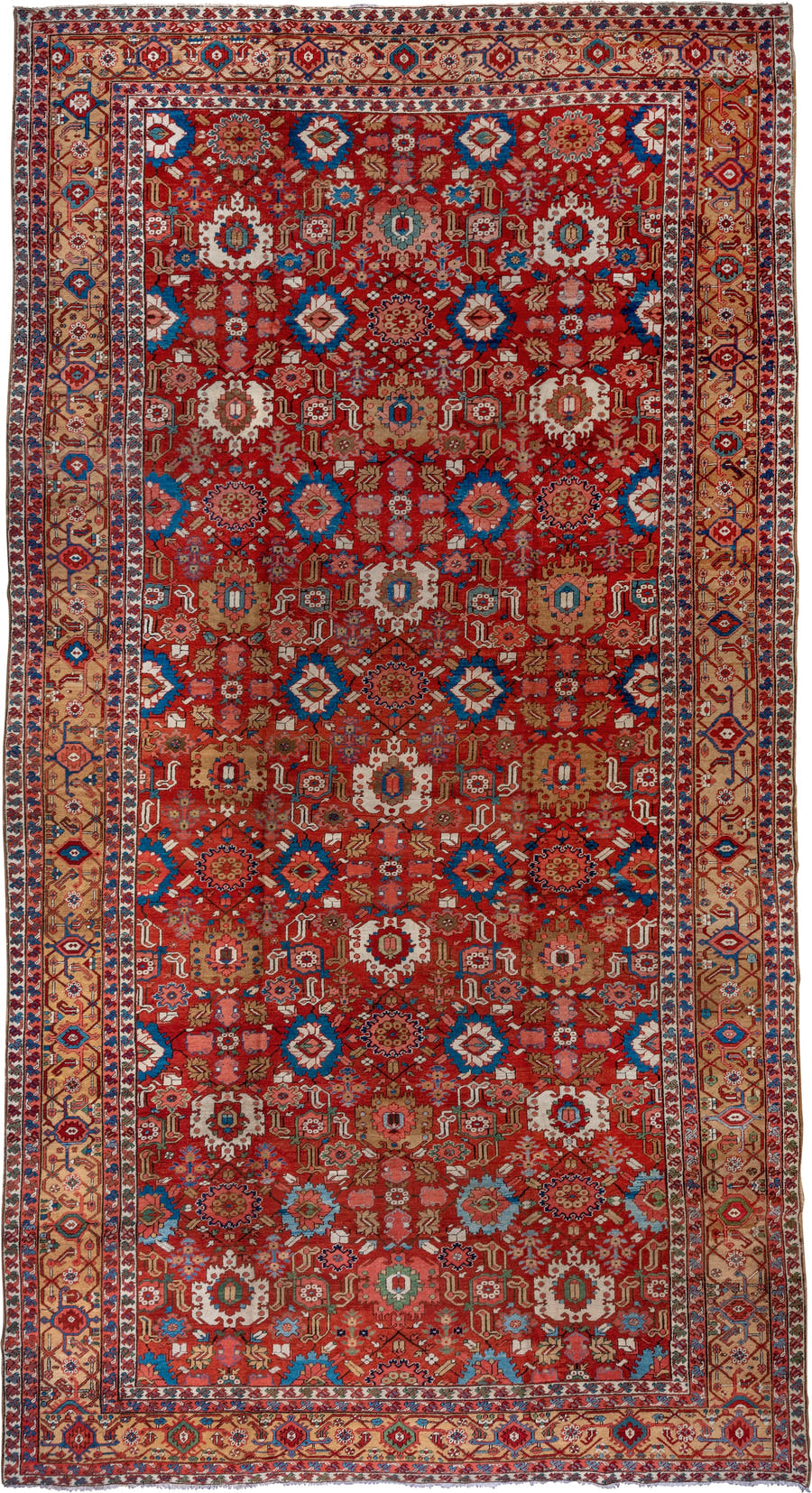 11' x 21' one-of-a-kind handmade antique Serapi oversize rug. Color palette: red, ivory, camel, blue, rose, rust, sage