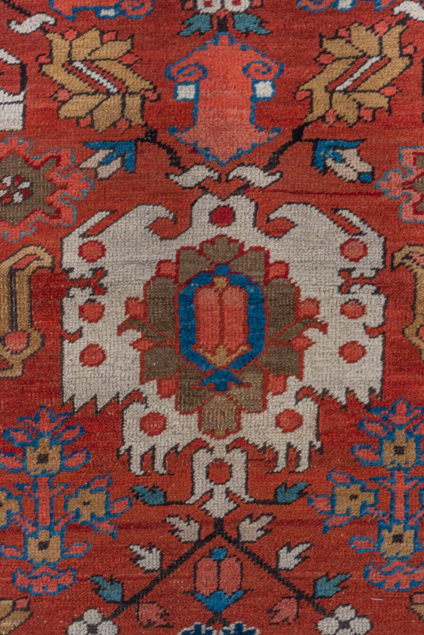 11' x 21' one-of-a-kind handmade antique Serapi oversize rug. Color palette: red, ivory, camel, blue, rose, rust, sage