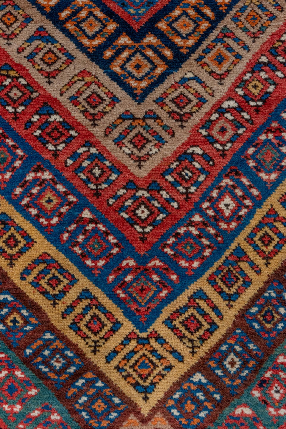 3' x 9' one-of-a-kind handmade vintage Genje runner rug. Color palette: rust, ivory, cobalt, navy, terra cotta, camel