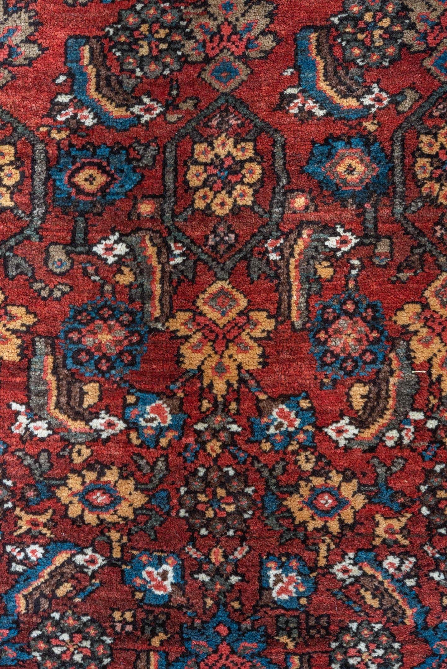 4' x 6' one-of-a-kind handmade vintage Kurd small size rug. Color palette: red, ivory, indigo, rust, navy, camel, burgundy
