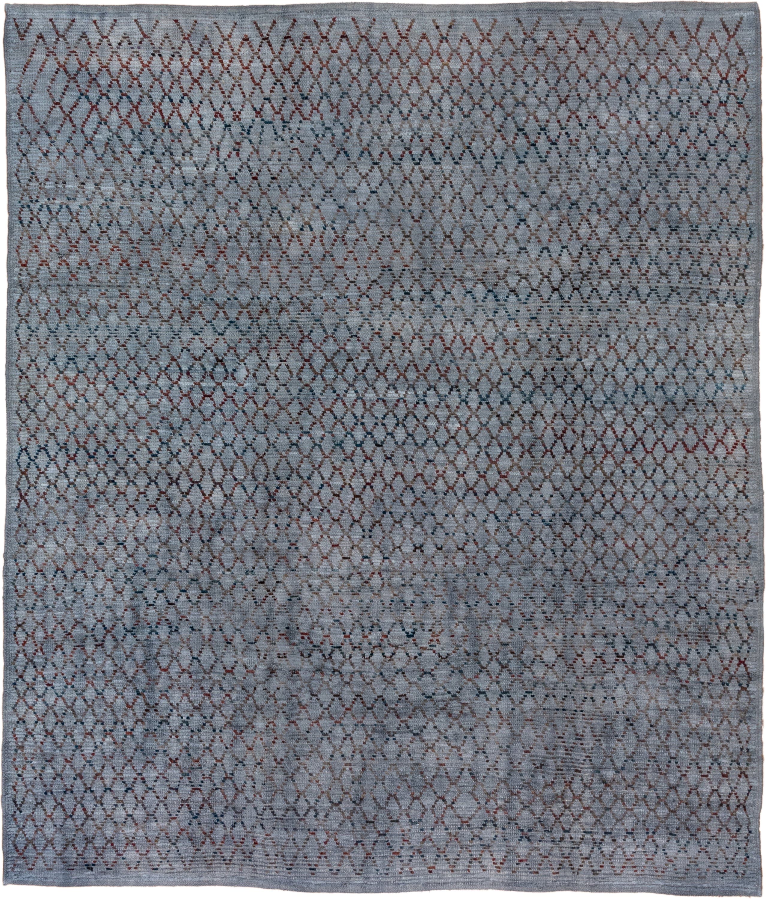 8' x 9' one-of-a-kind handmade vintage Tulu rug. Color palette: blue-gray, slate, rust, charcoal, taupe, gray, blue