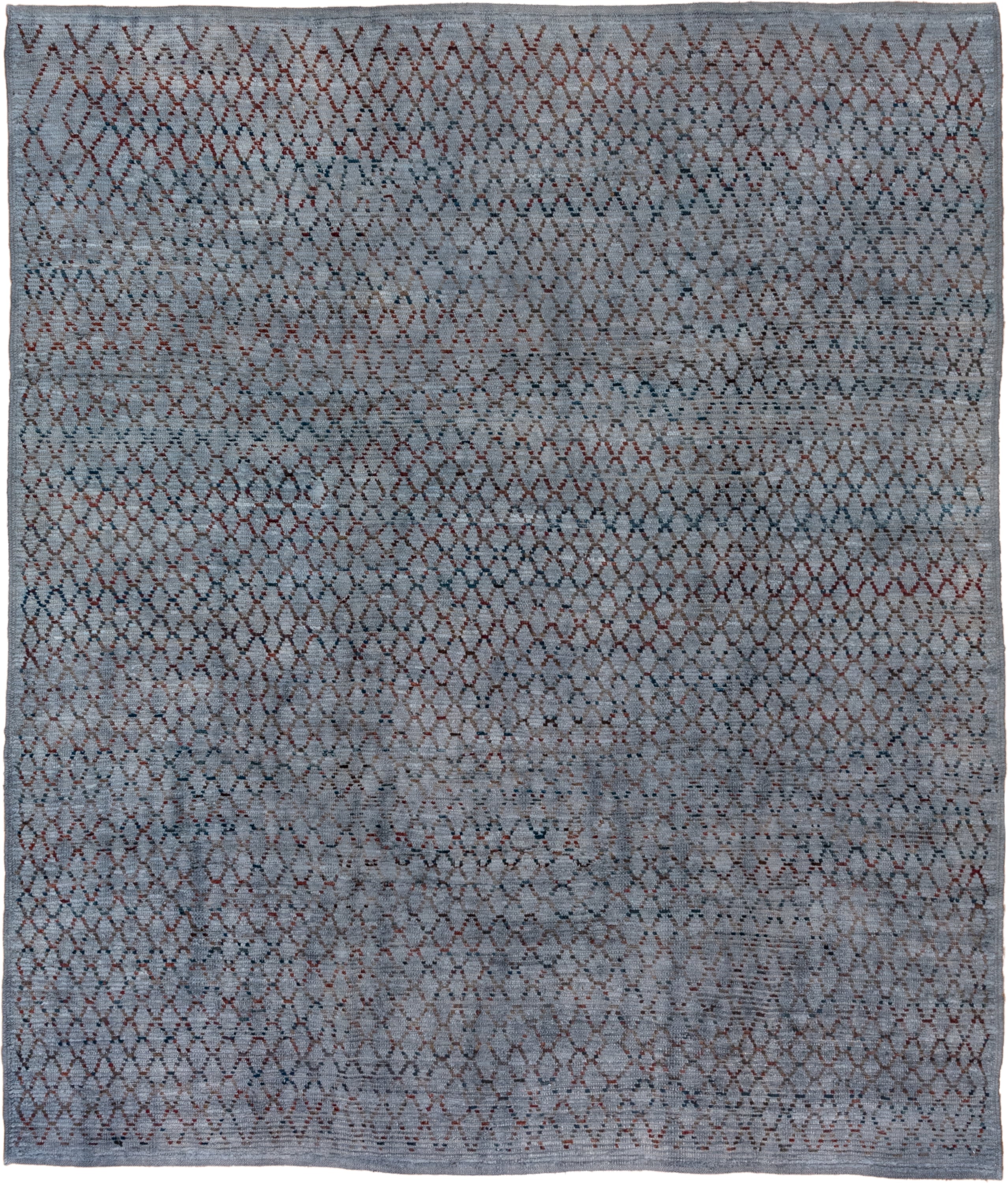 8' x 9' one-of-a-kind handmade vintage Tulu rug. Color palette: blue-gray, slate, rust, charcoal, taupe, gray, blue