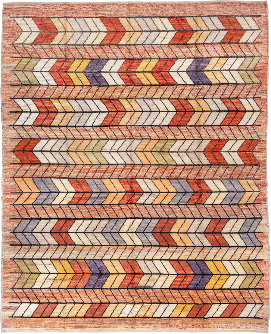 9' x 12' one-of-a-kind handmade vintage Tulu large size rug. Color palette: terra cotta, ivory, rust, peach, gold, violet