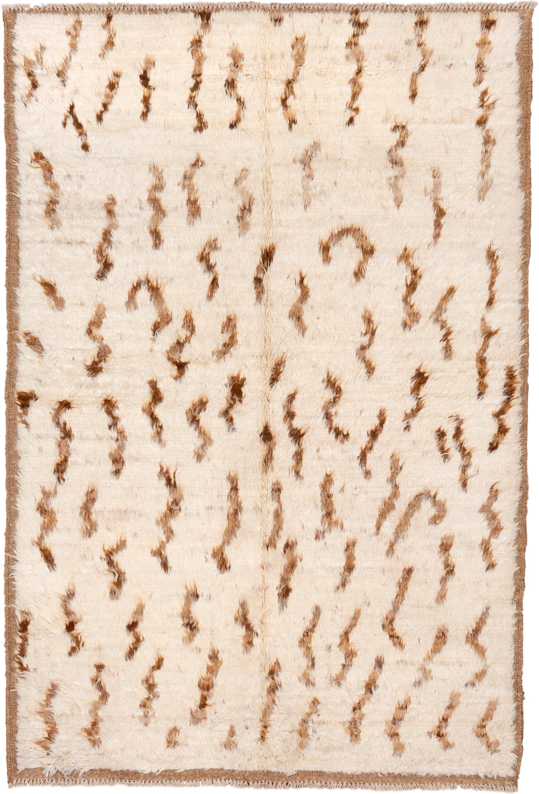 5' x 8' one-of-a-kind handmade vintage Moroccan medium size rug. Color palette: ivory, camel, brown, cream, beige