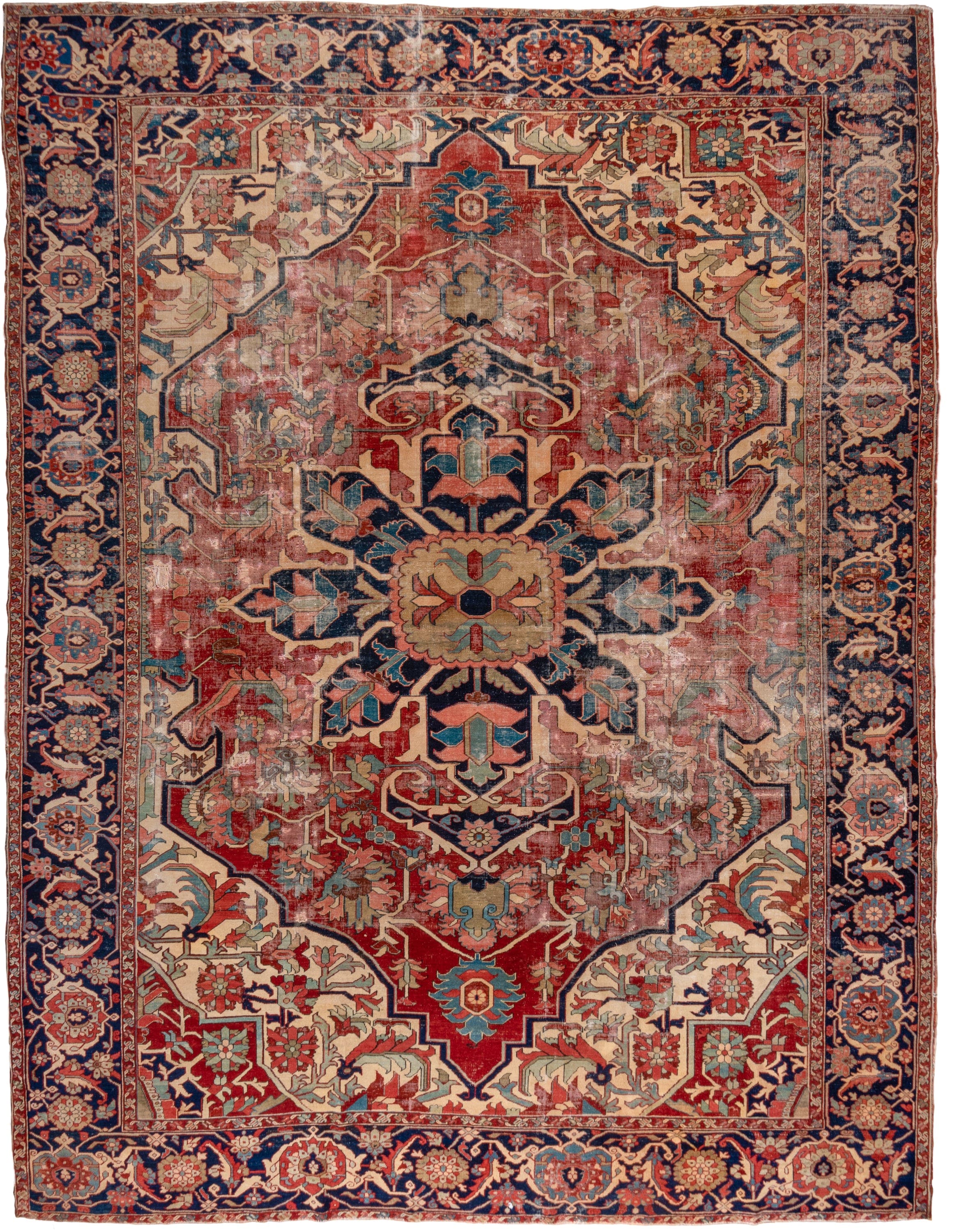 12' x 16' one-of-a-kind handmade vintage Serapi oversize rug. Color palette: red, navy, ivory, rust, sky blue, sage, camel