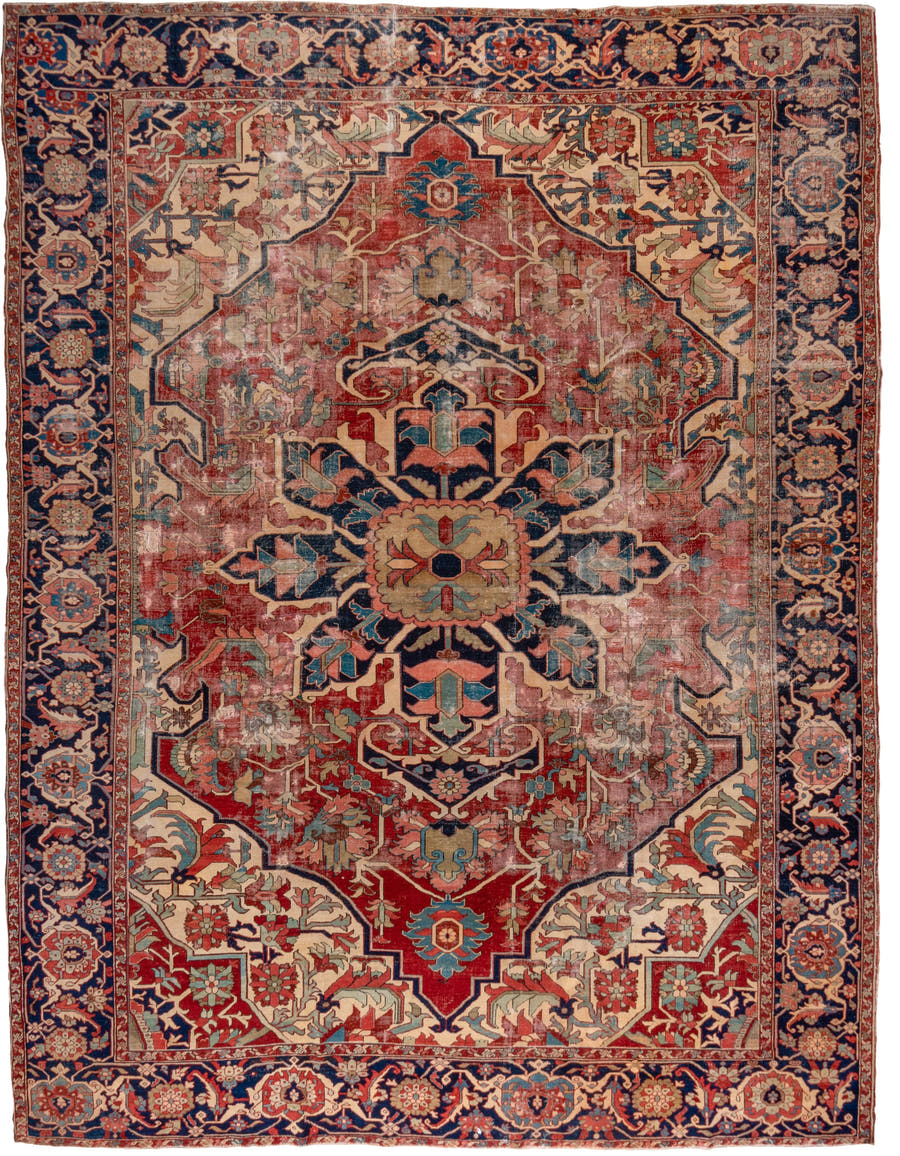 12' x 16' one-of-a-kind handmade vintage Serapi oversize rug. Color palette: red, navy, ivory, rust, sky blue, sage, camel