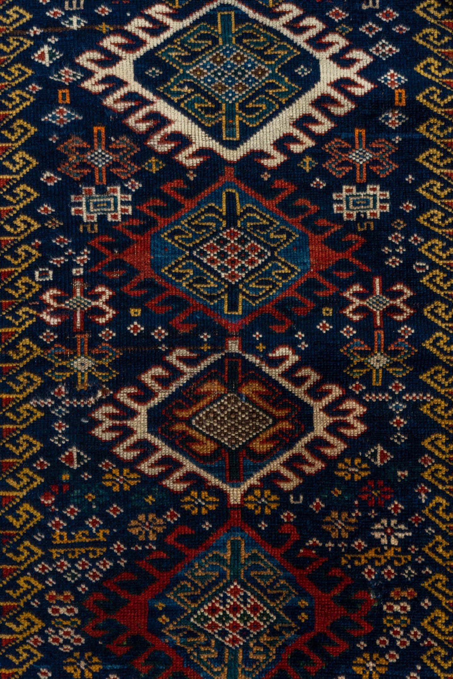 3' x 5' one-of-a-kind handmade vintage Shirvan small size rug. Color palette: navy, ivory, cobalt, crimson, rust, camel
