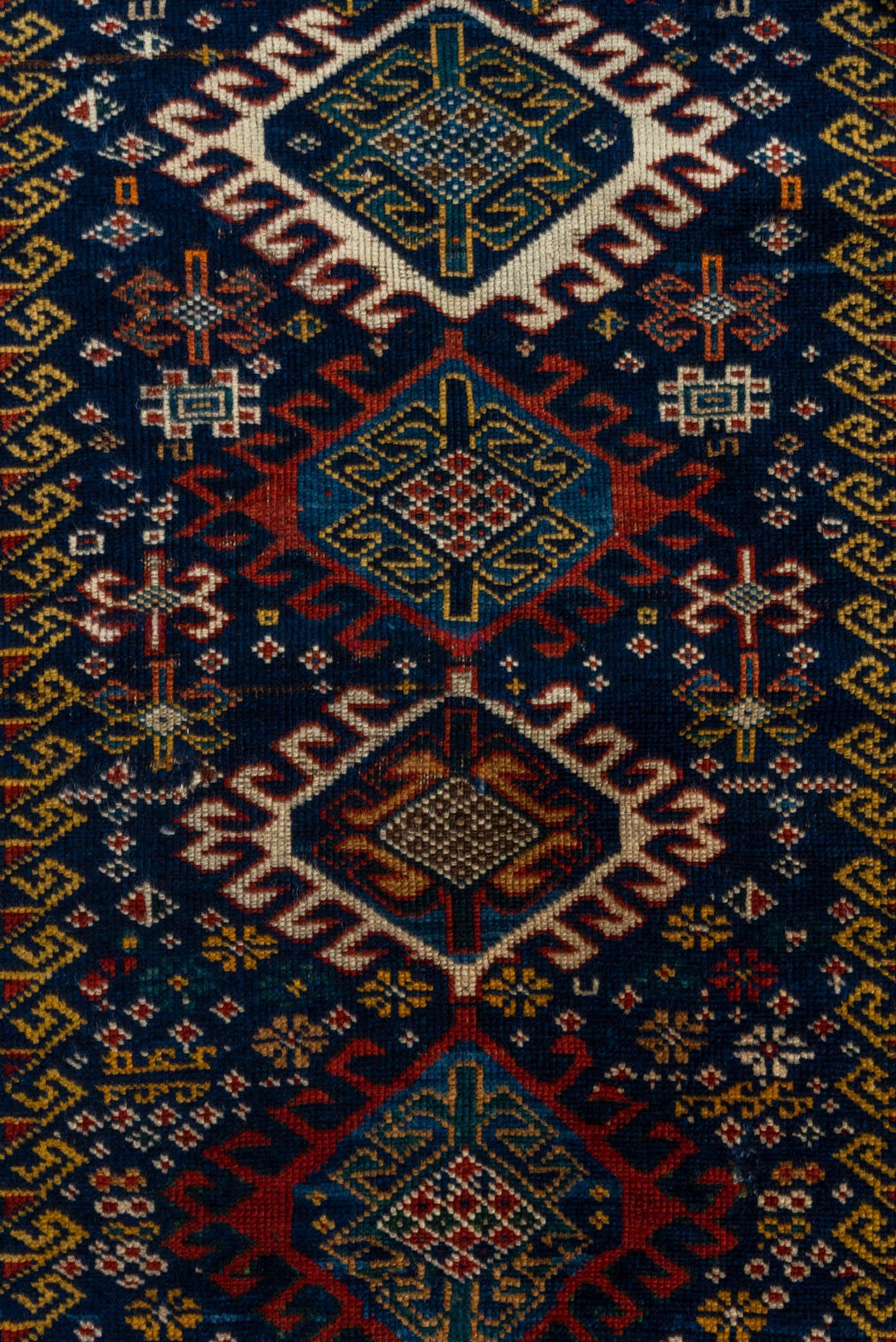 3' x 5' one-of-a-kind handmade vintage Shirvan small size rug. Color palette: navy, ivory, cobalt, crimson, rust, camel