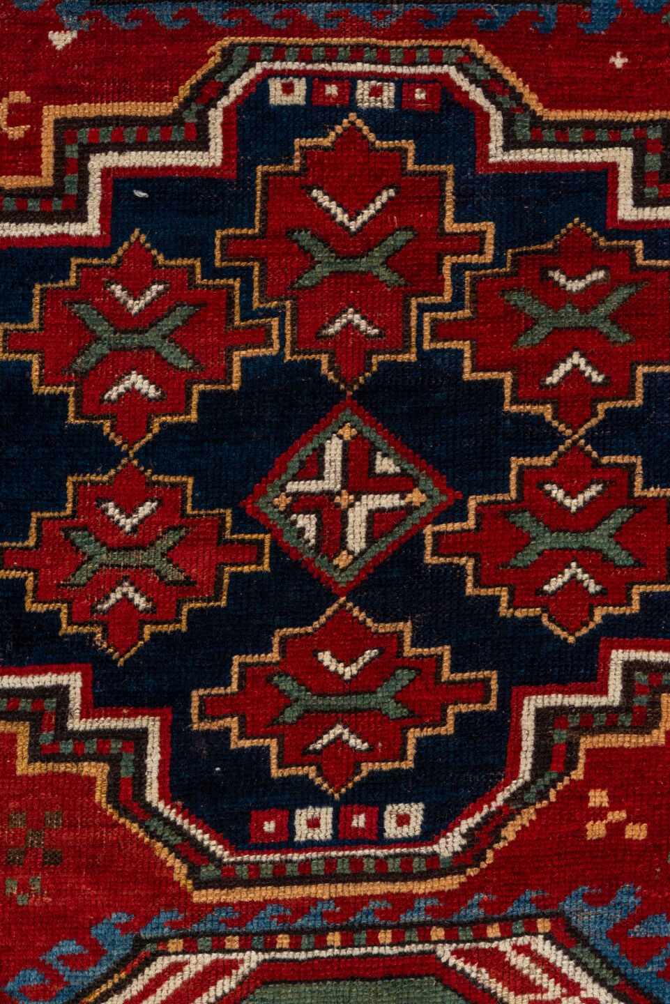 5' x 7' one-of-a-kind handmade vintage Kazak rug. Color palette: red, ivory, sky_blue, navy, brown, sage, camel, light blue