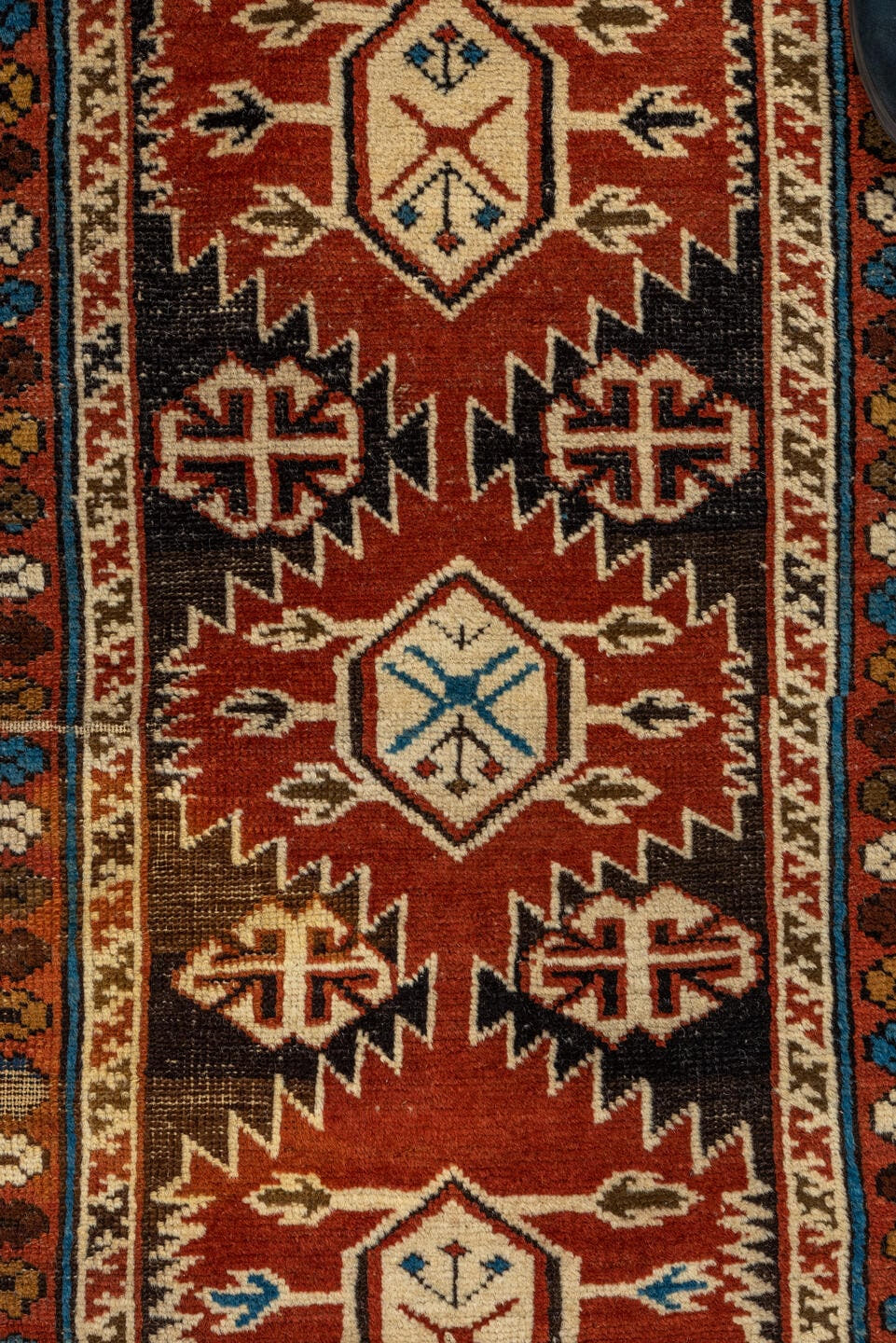 3' x 4' one-of-a-kind handmade vintage Shirvan small size rug. Color palette: rust, camel, ivory, black, sky blue
