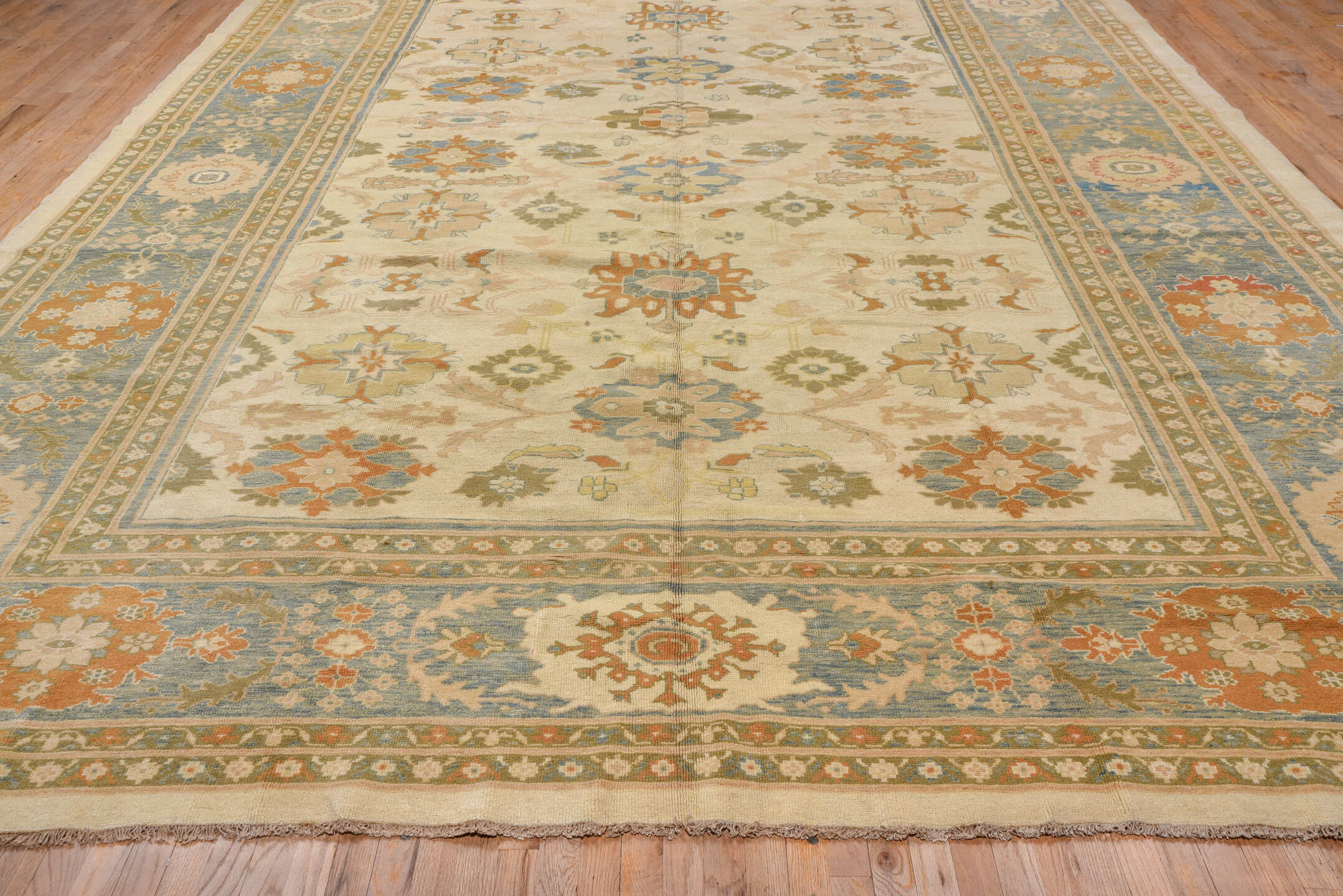 12' x 16' one-of-a-kind handmade vintage Sultanabad oversize rug. Color palette: ivory, sky blue, taupe, rust, gold, beige