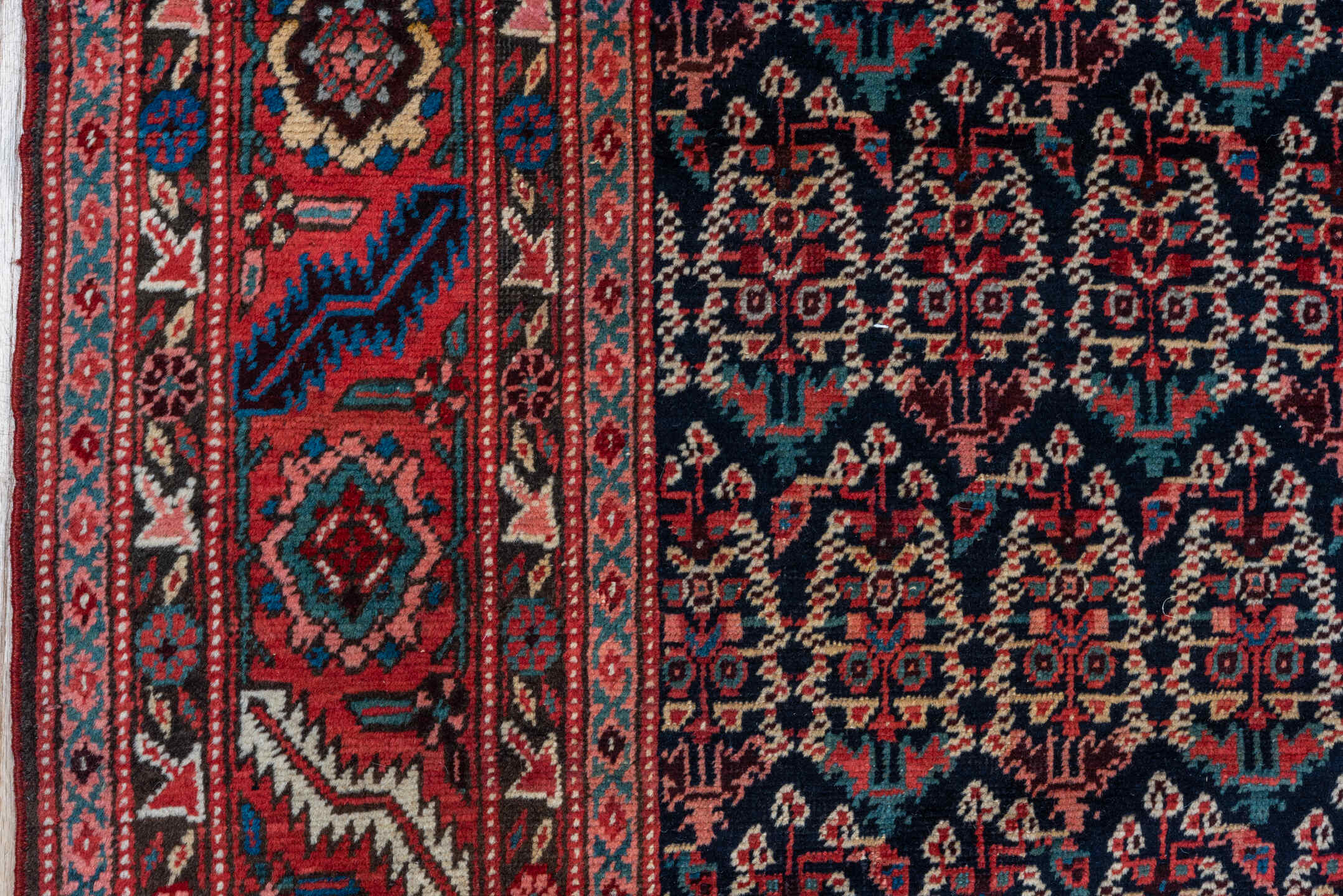 7' x 14' one-of-a-kind handmade vintage Bakhshayesh rug. Color palette: navy, rust, brick red, ivory, cobalt, camel