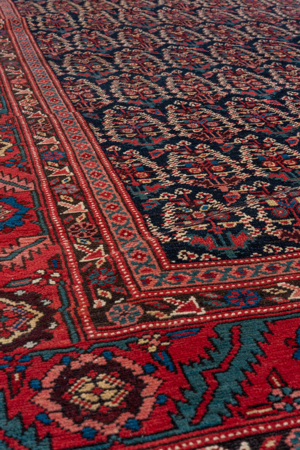 7' x 14' one-of-a-kind handmade vintage Bakhshayesh rug. Color palette: navy, rust, brick red, ivory, cobalt, camel