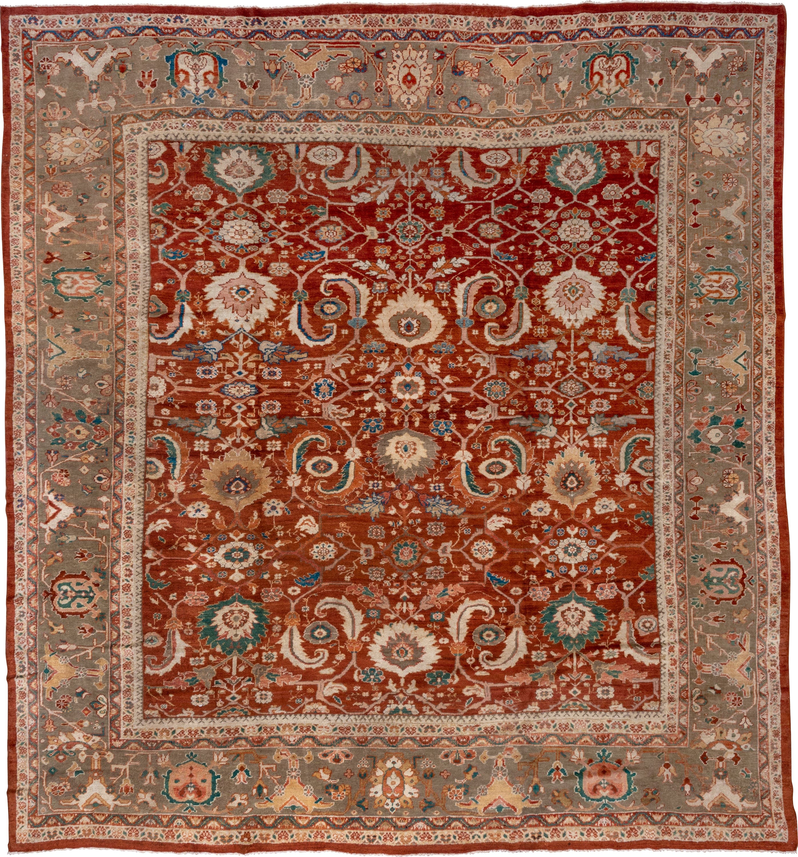 12' x 13' one-of-a-kind handmade vintage Sultanabad oversize rug. Color palette: rust, taupe, ivory, teal, blue, terra cotta