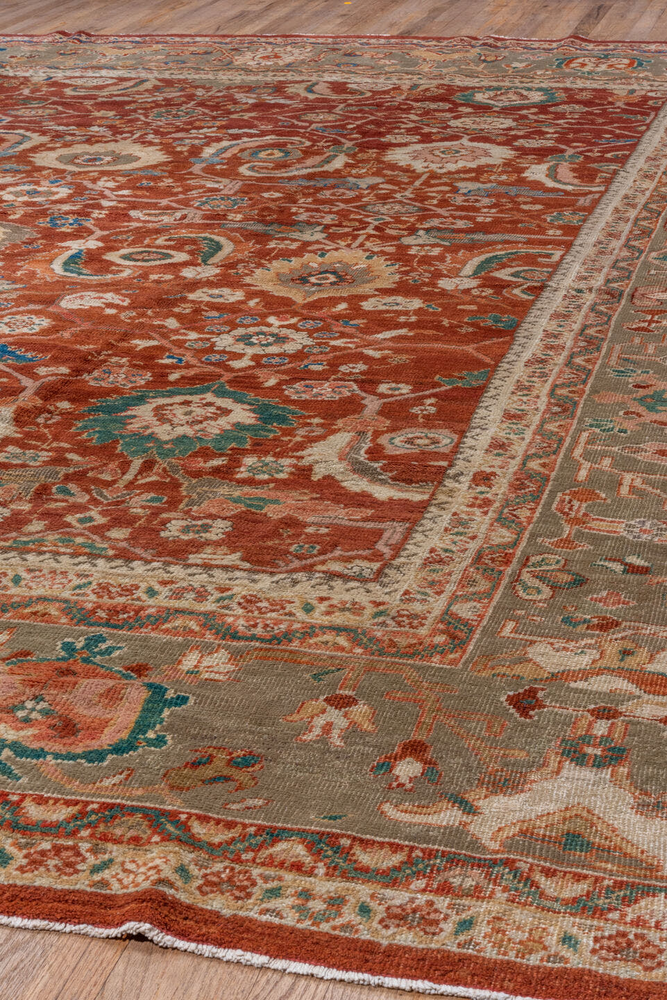 12' x 13' one-of-a-kind handmade vintage Sultanabad oversize rug. Color palette: rust, taupe, ivory, teal, blue, terra cotta