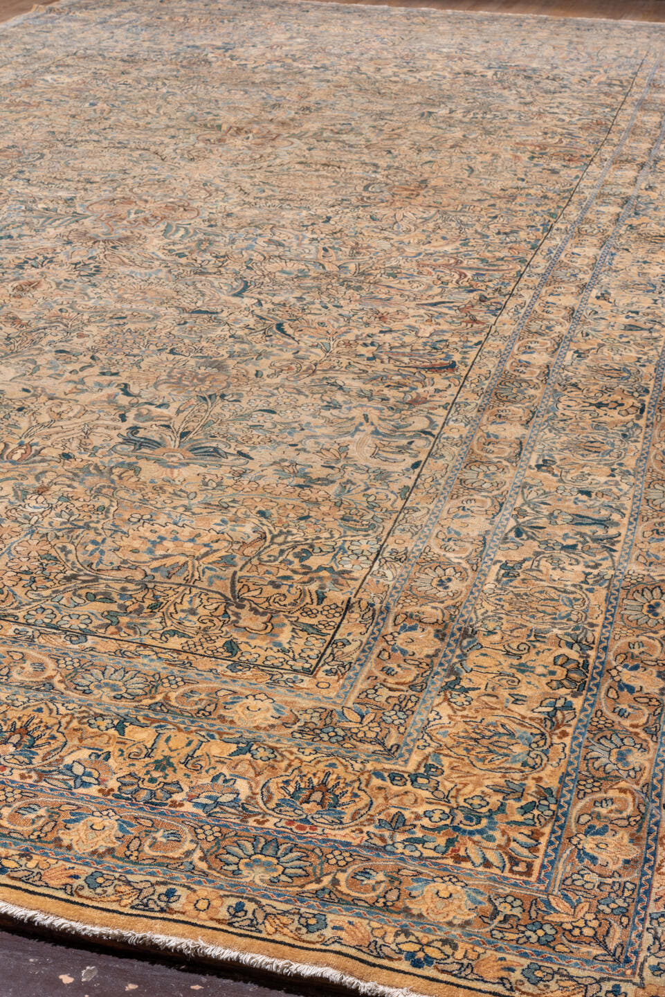 9' x 18' one-of-a-kind handmade vintage Kerman rug. Color palette: ivory, camel, muted blue, taupe, slate, tan, sienna