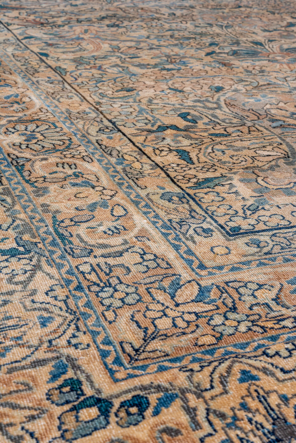 9' x 18' one-of-a-kind handmade vintage Kerman rug. Color palette: ivory, camel, muted blue, taupe, slate, tan, sienna