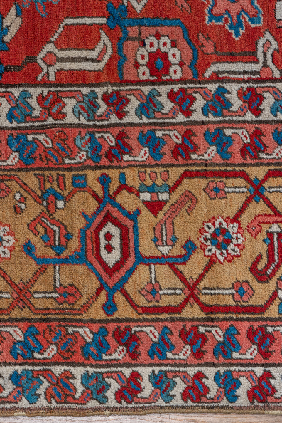 11' x 21' one-of-a-kind handmade antique Serapi oversize rug. Color palette: red, ivory, camel, blue, rose, rust, sage