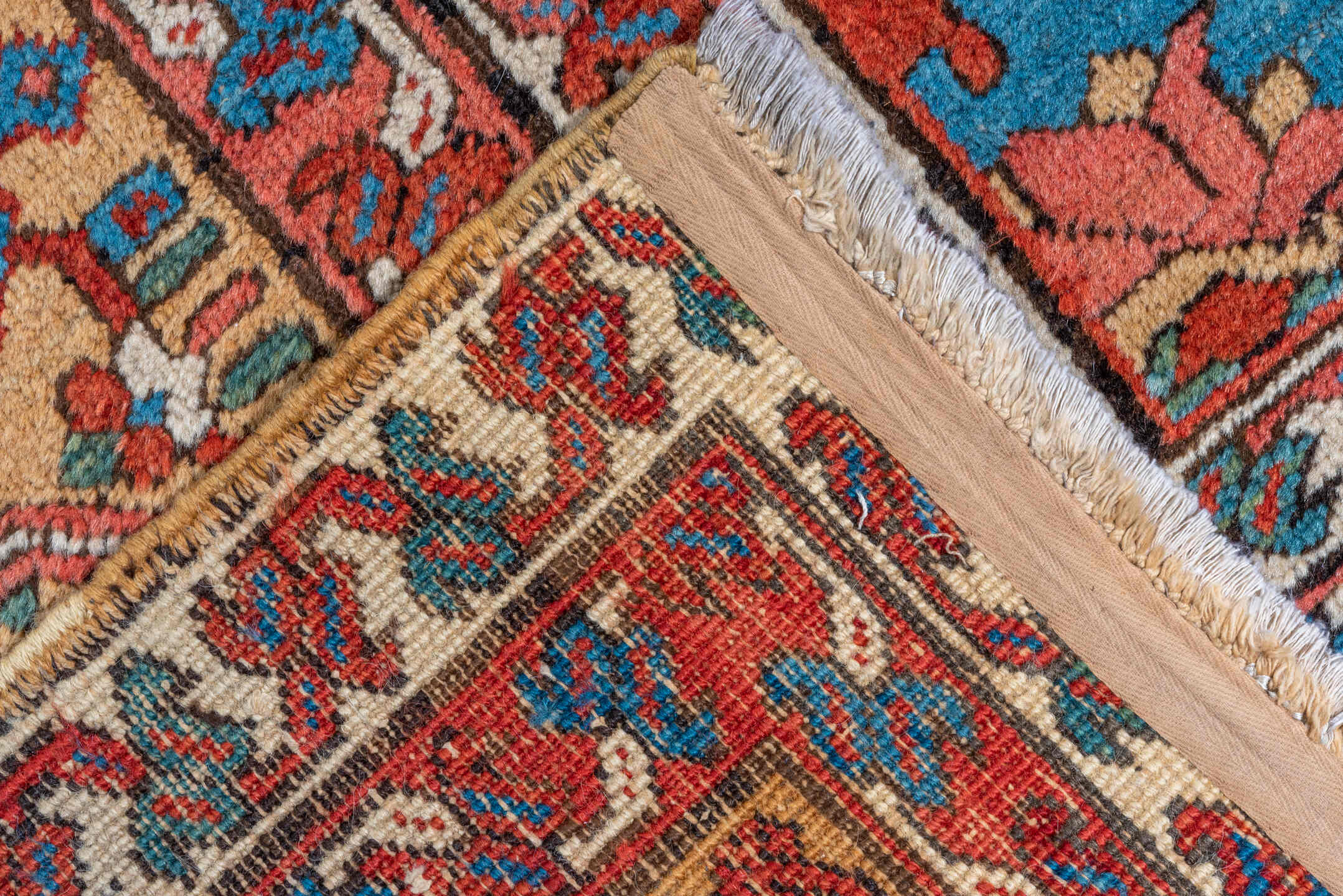 11' x 21' one-of-a-kind handmade antique Serapi oversize rug. Color palette: red, ivory, camel, blue, rose, rust, sage