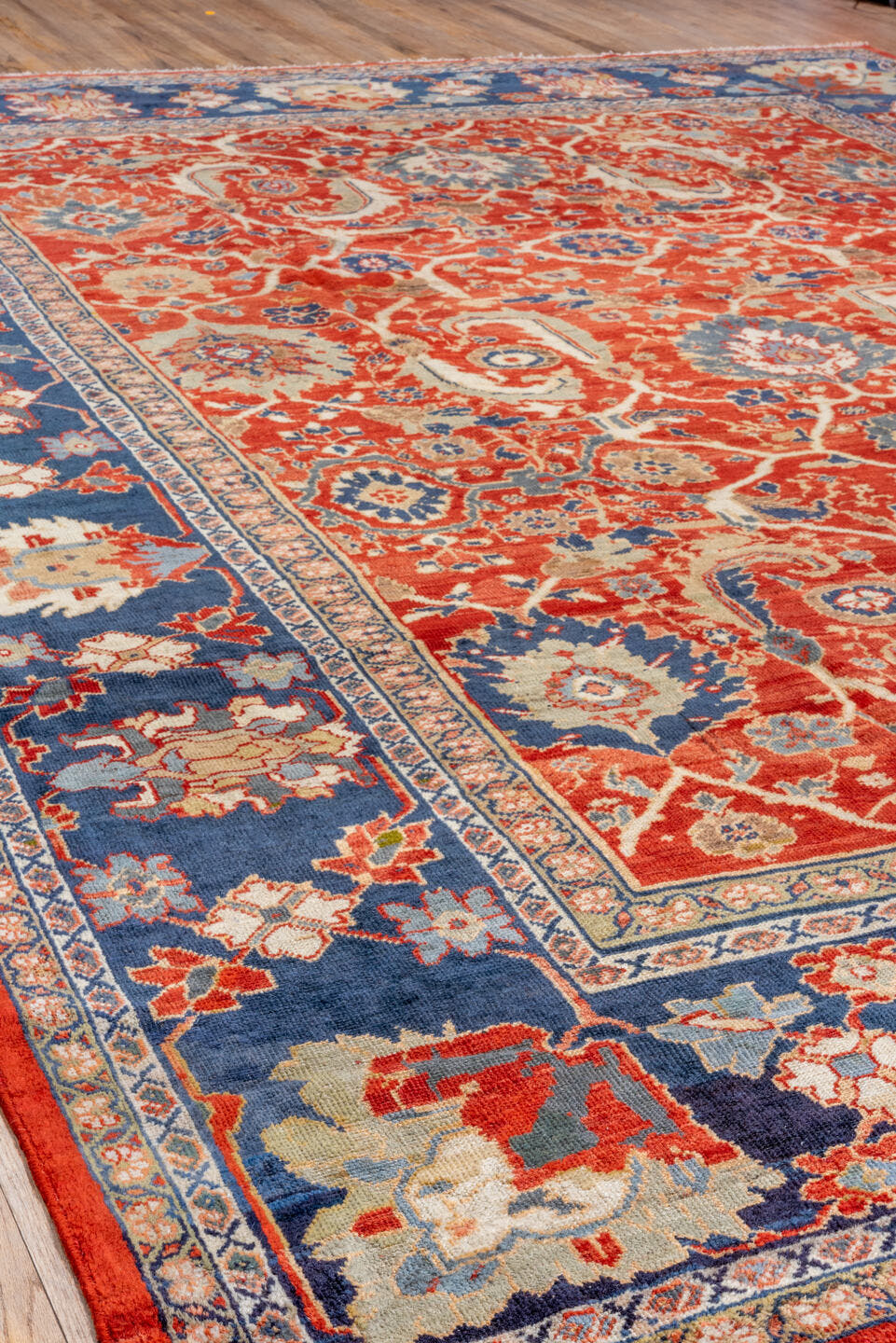 11' x 14' one-of-a-kind handmade vintage Sultanabad oversize rug. Color palette: rust, navy, ivory, slate, camel, crimson