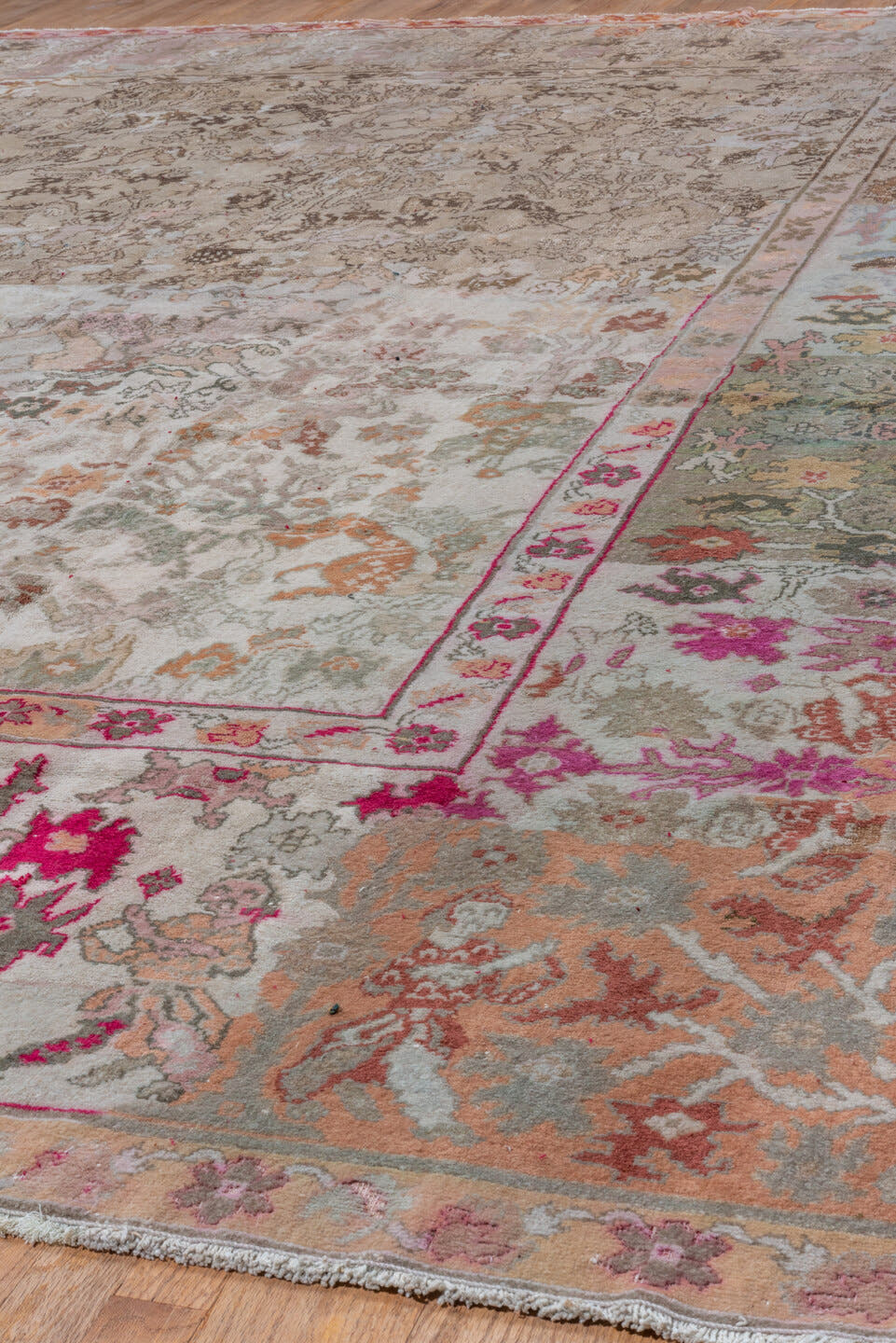11' x 13' one-of-a-kind handmade vintage Amritzar oversize rug. Color palette: taupe, ivory, rose, sage, coral, brown
