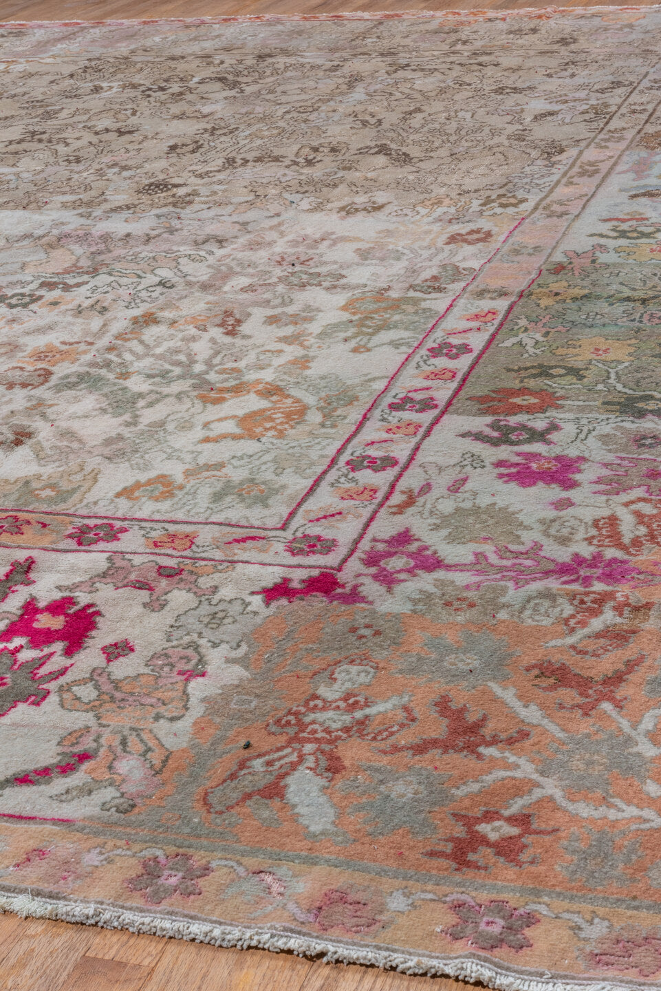 11' x 13' one-of-a-kind handmade vintage Amritzar oversize rug. Color palette: taupe, ivory, rose, sage, coral, brown